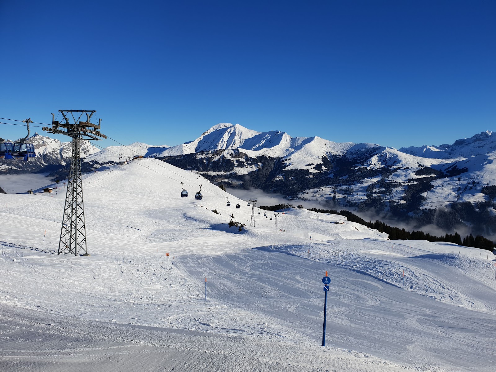 Traditional wooden chalets in the village of Adelboden under snow