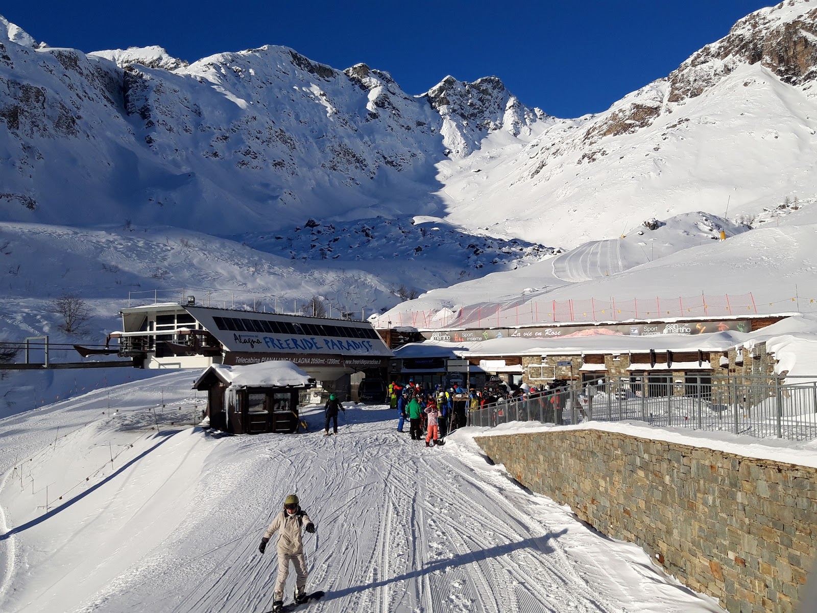 The Walser village of Alagna under snow beneath the steep Monte Rosa faces