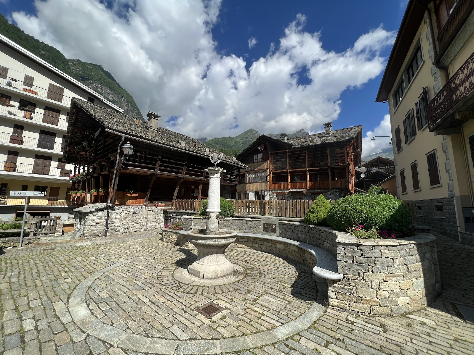 A small traditional alpine village under snowy mountains