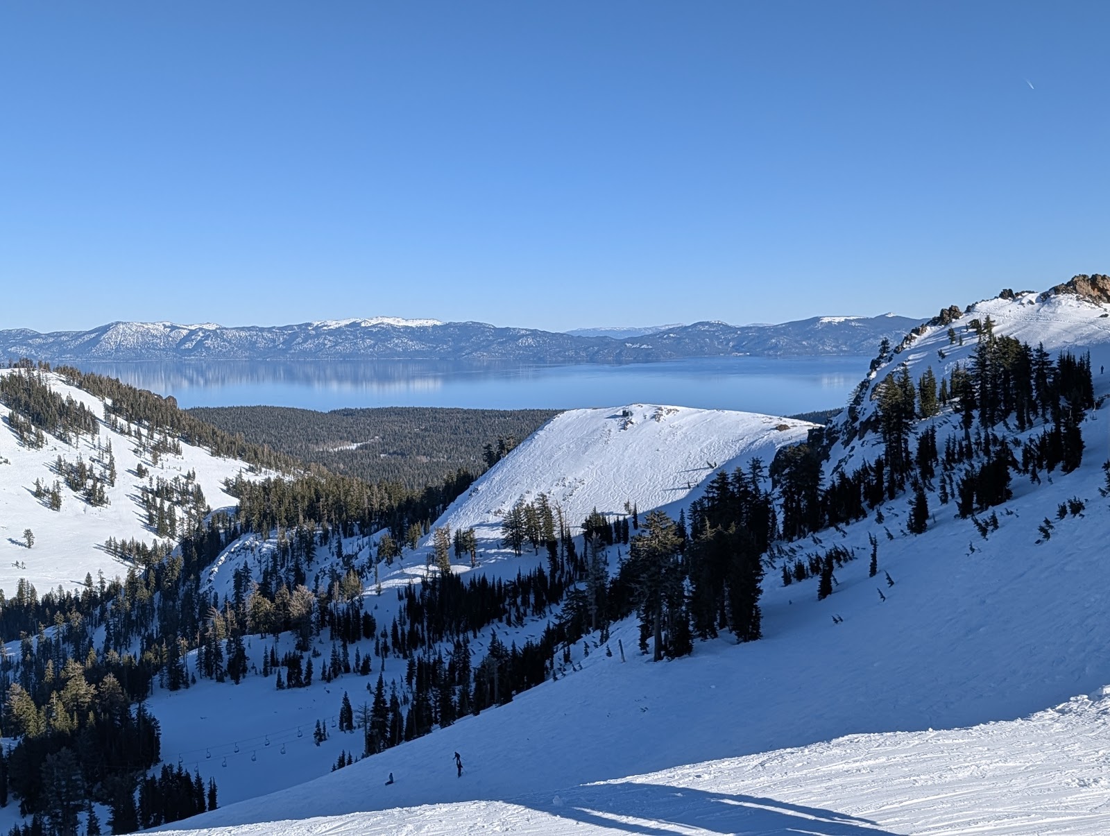 Lake Tahoe ski piste under bright Sierra sun