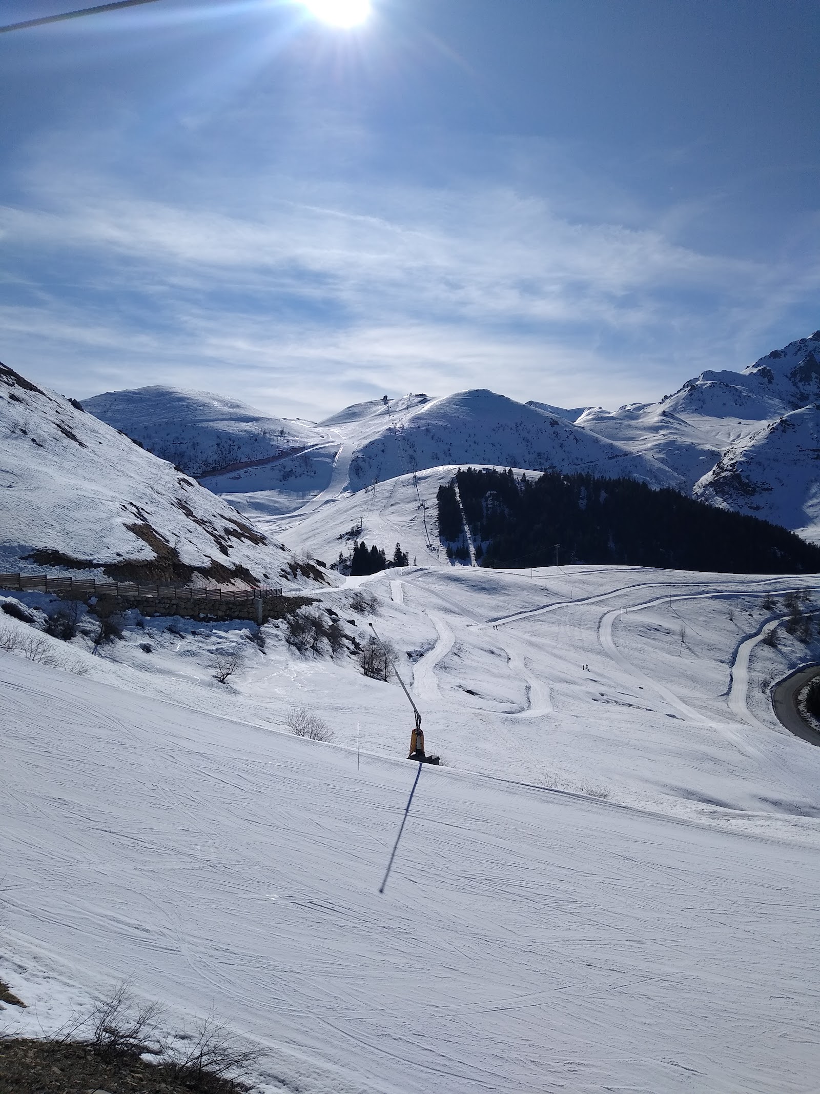 The compact ski base at Artesina with slopes rising behind