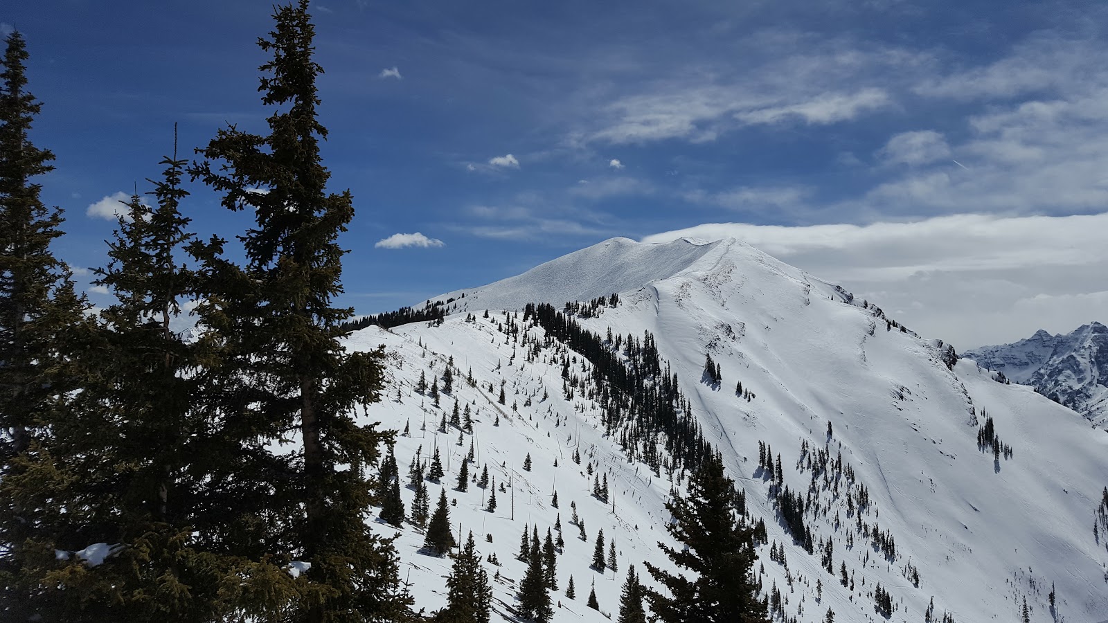 Steep snowy Colorado slopes like the terrain at Aspen Highlands