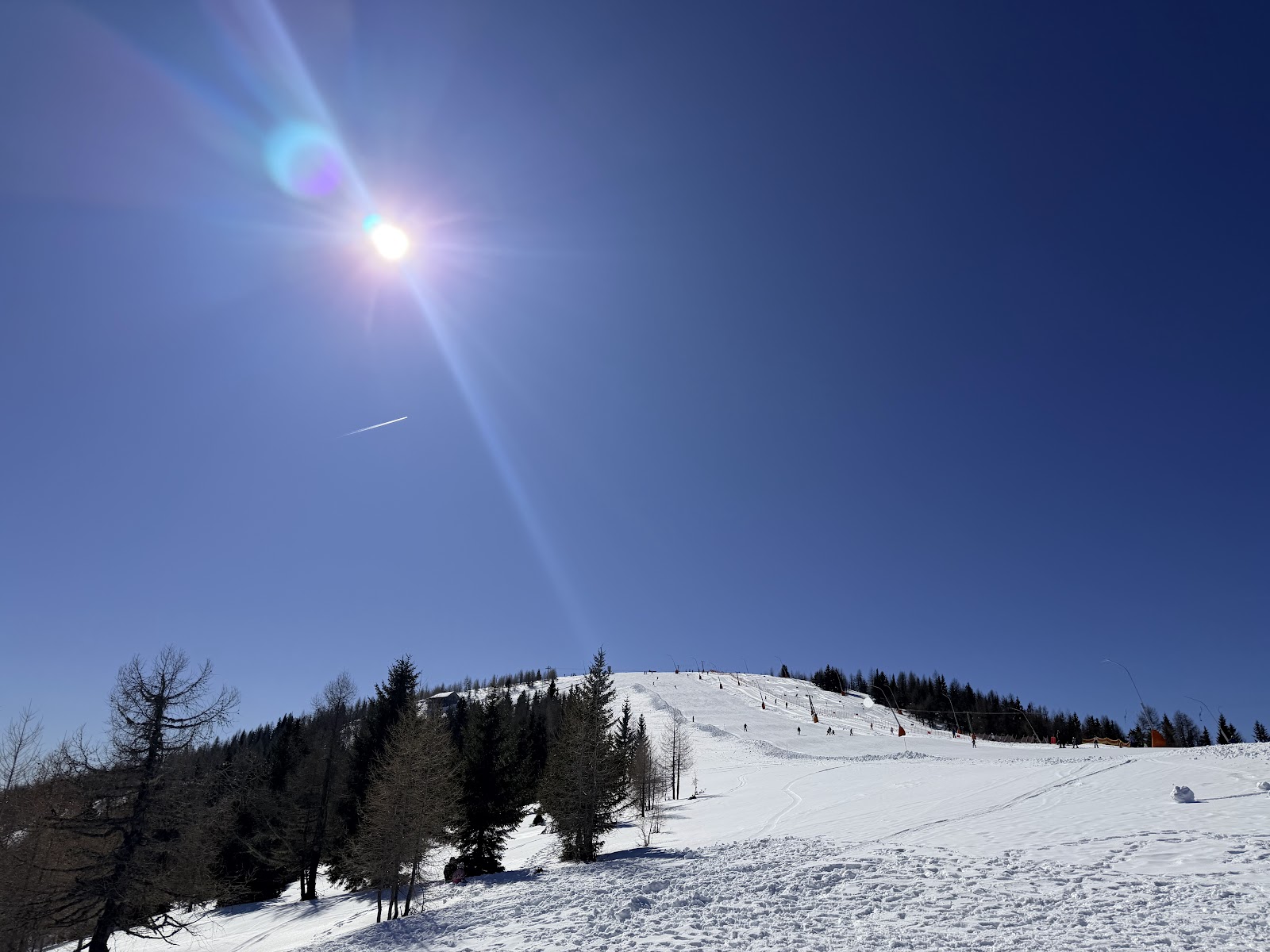 Skiers descending the Franz Klammer downhill course at Bad Kleinkirchheim