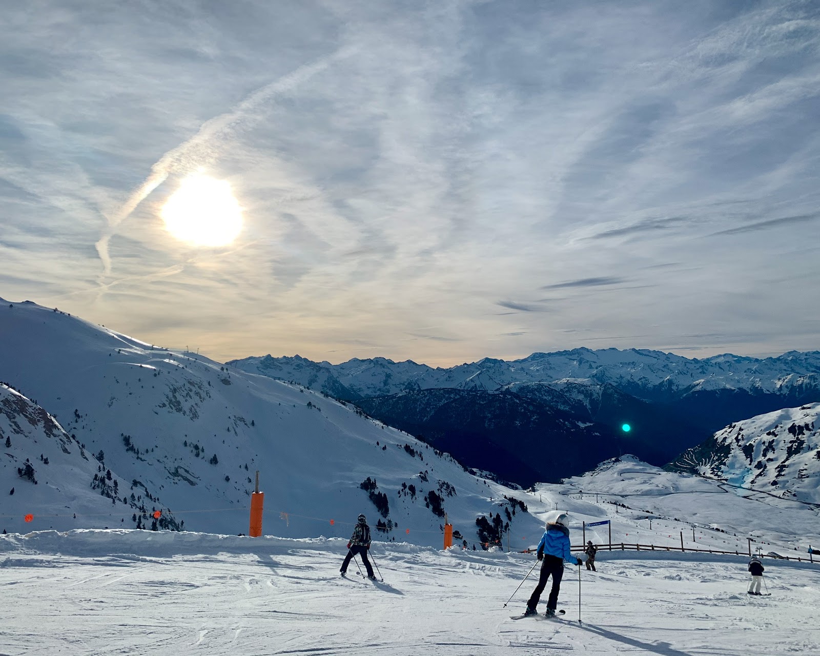 Wide snowy pistes and Pyrenees peaks above Baqueira Beret
