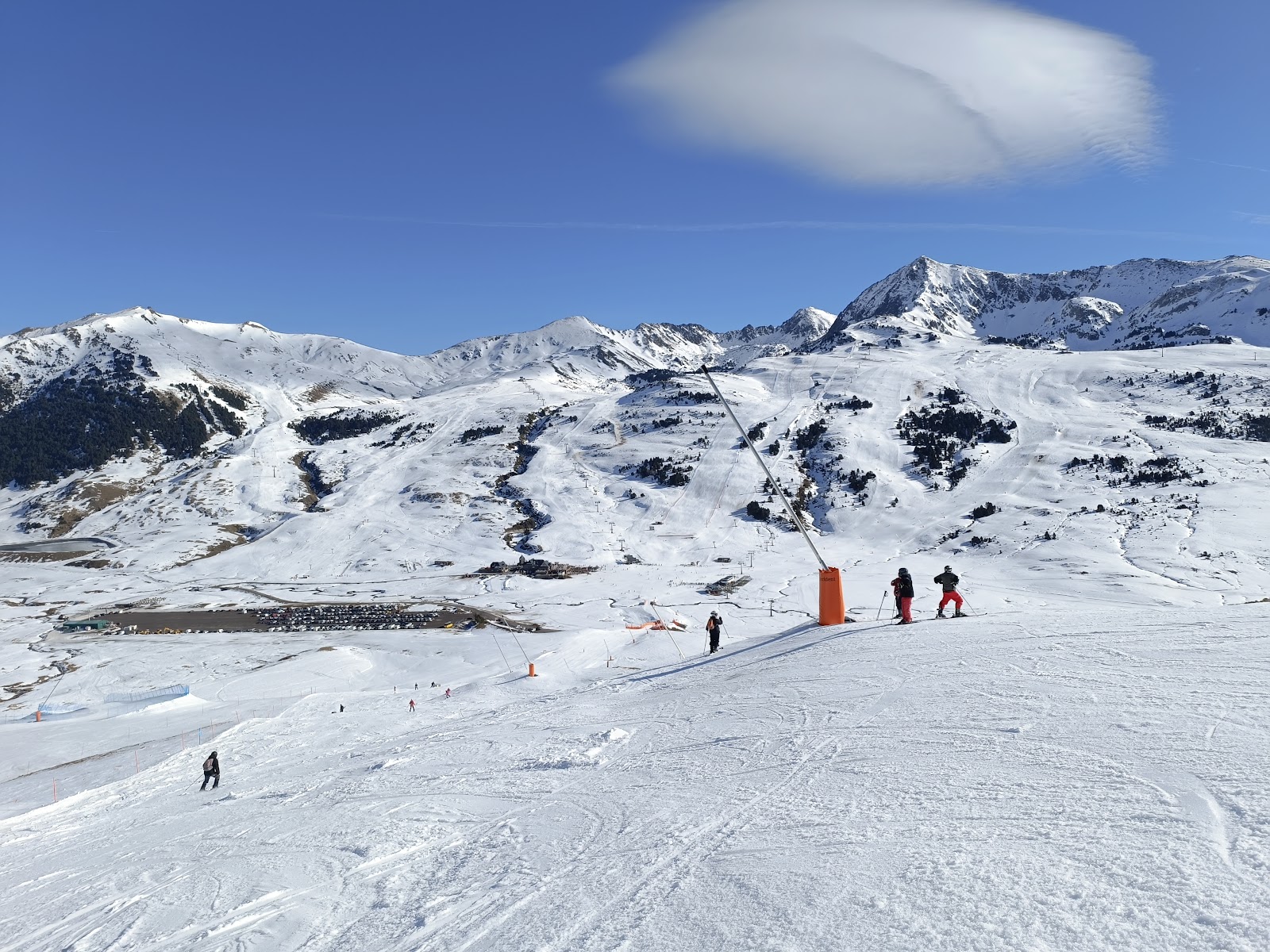 Skiers on a groomed run at Baqueira Beret in the Val d'Aran