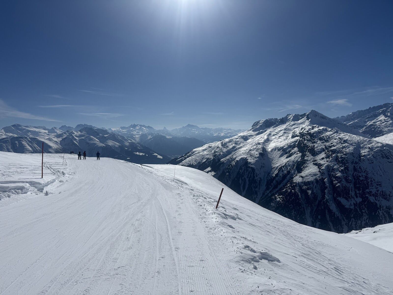 The sun terrace village of Bellwald above the Goms valley under winter snow