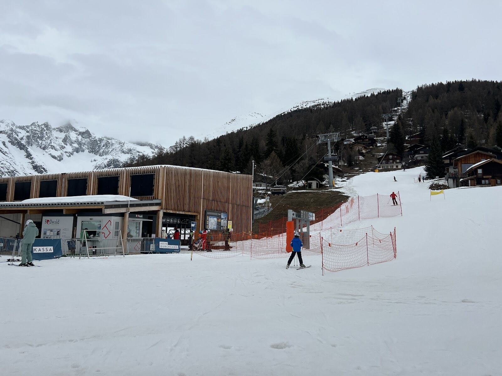 Larch chalets under deep snow in the village of Bellwald