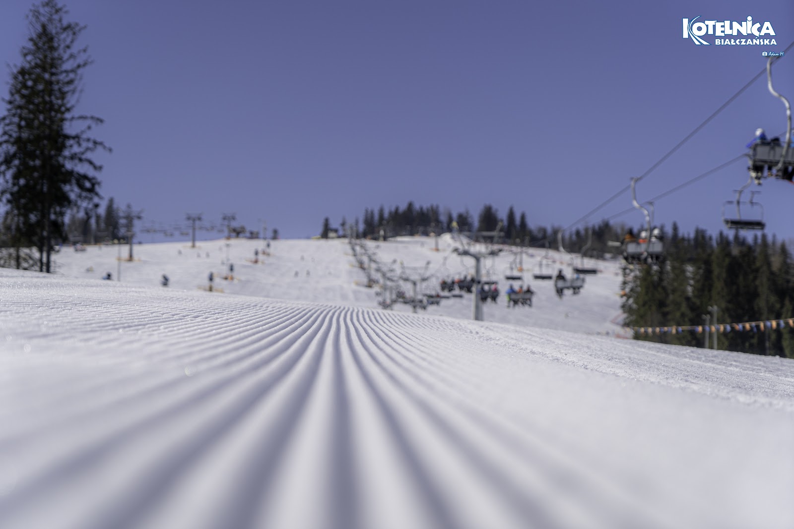 Modern chairlifts and groomed pistes at Bialka Tatrzanska in southern Poland