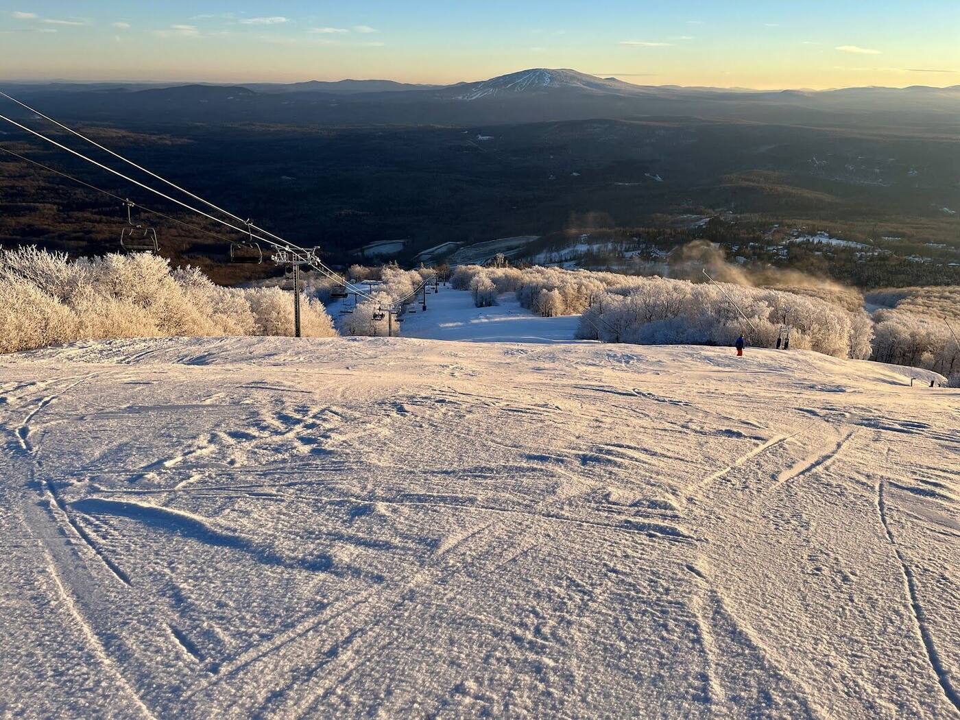 Snow covered trees and family terrain on Sun Mountain Bromley