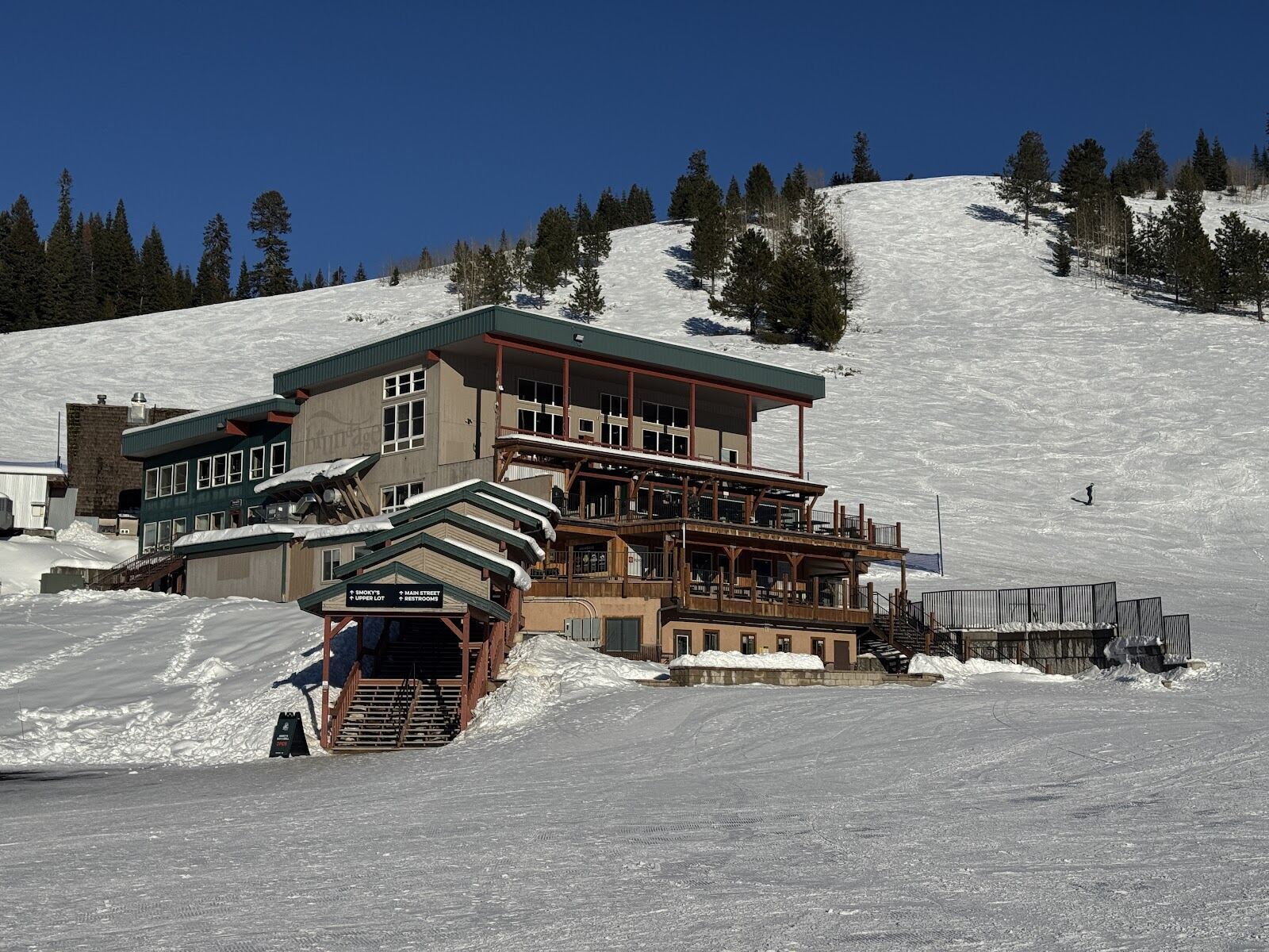 Wide open powder slopes under blue sky at Brundage Mountain Idaho
