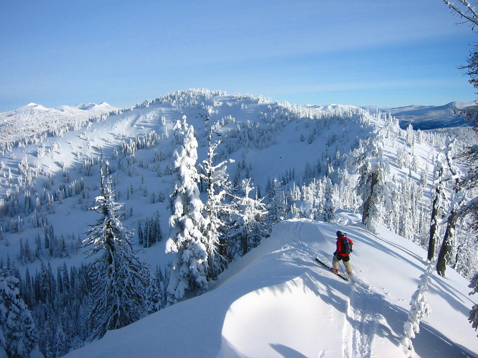 Chairlift climbing the quiet slopes above McCall in winter