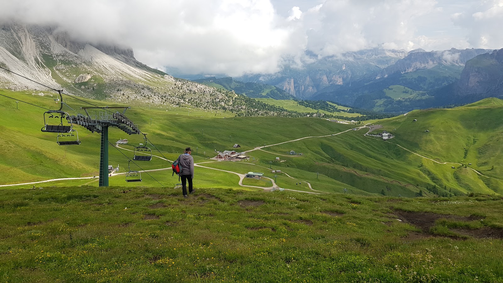 Campitello di Fassa village below the Dolomites peaks