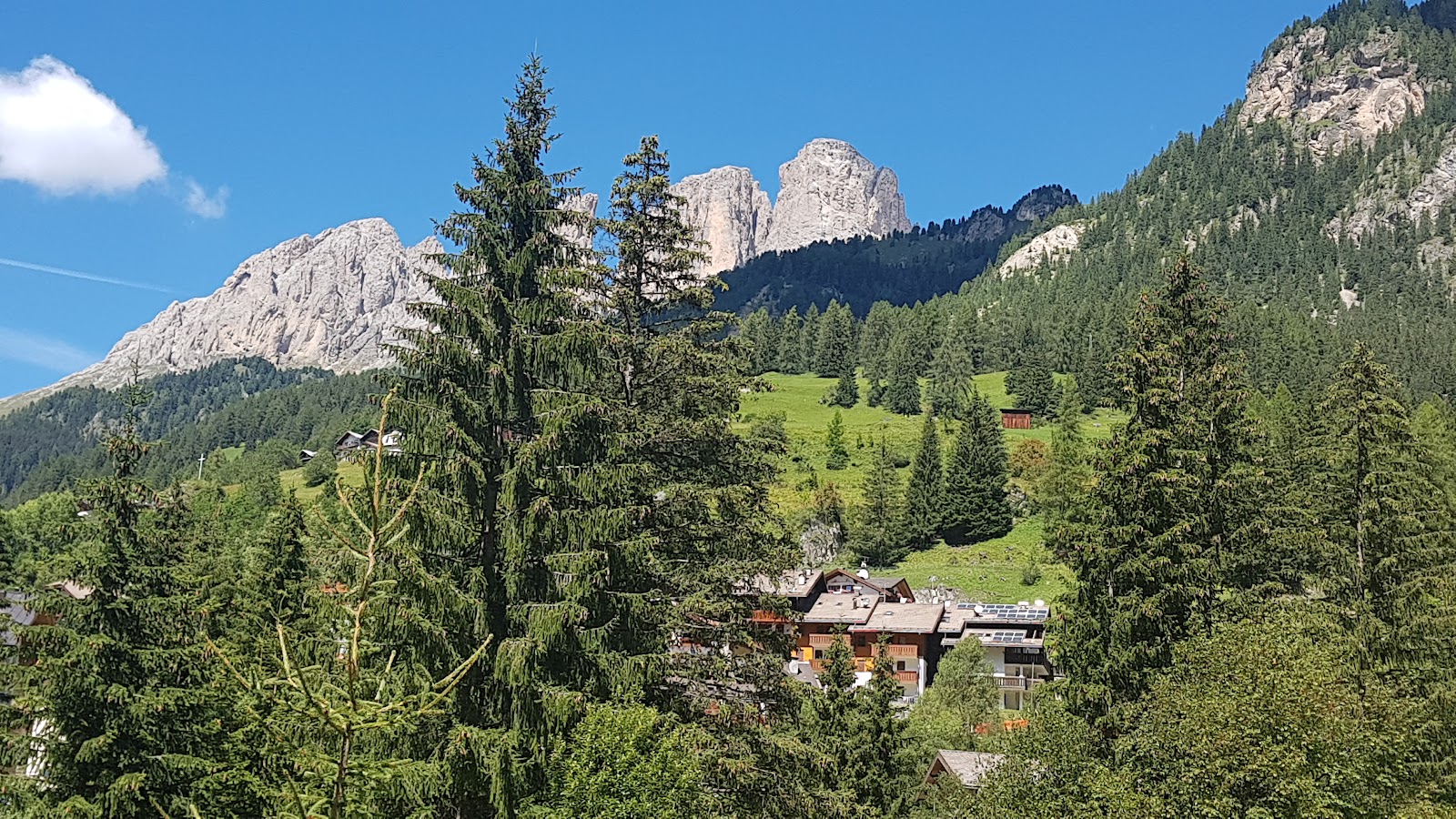 Sunny groomed pistes on the Sella Ronda above Campitello