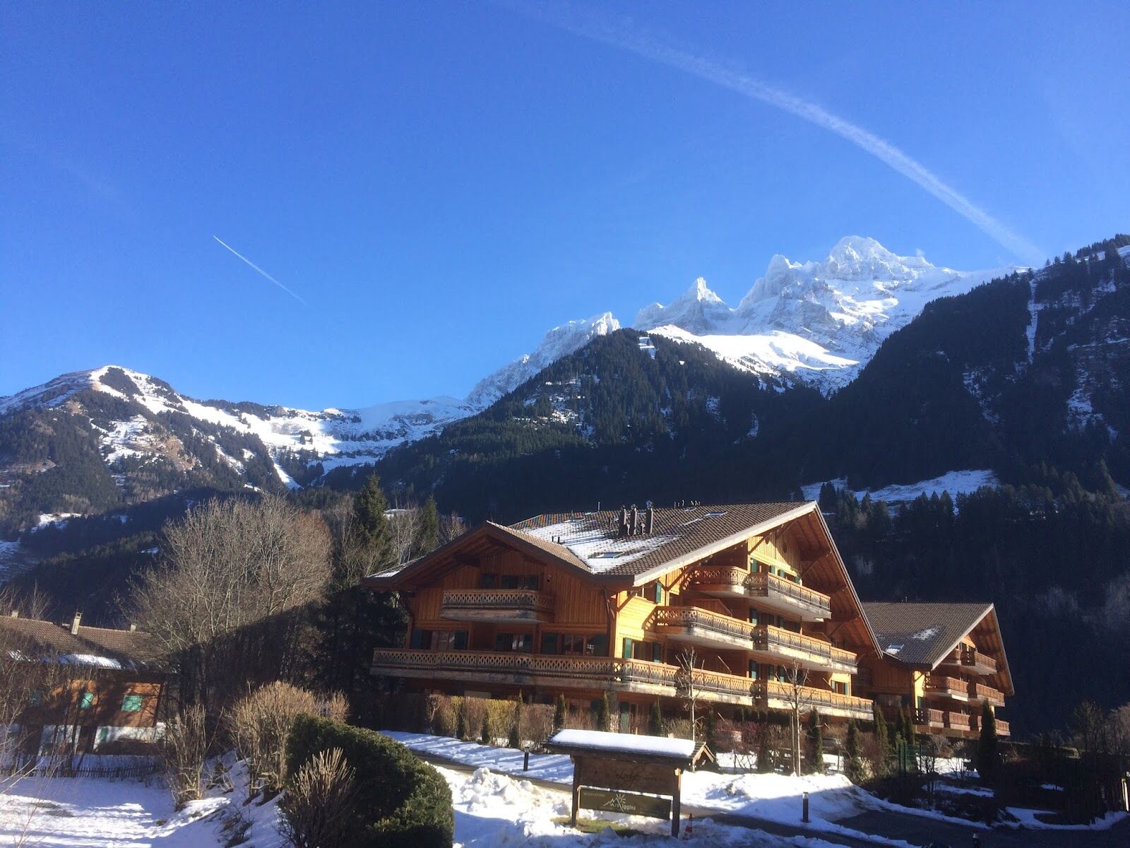 The Dents du Midi peaks rising above Champery