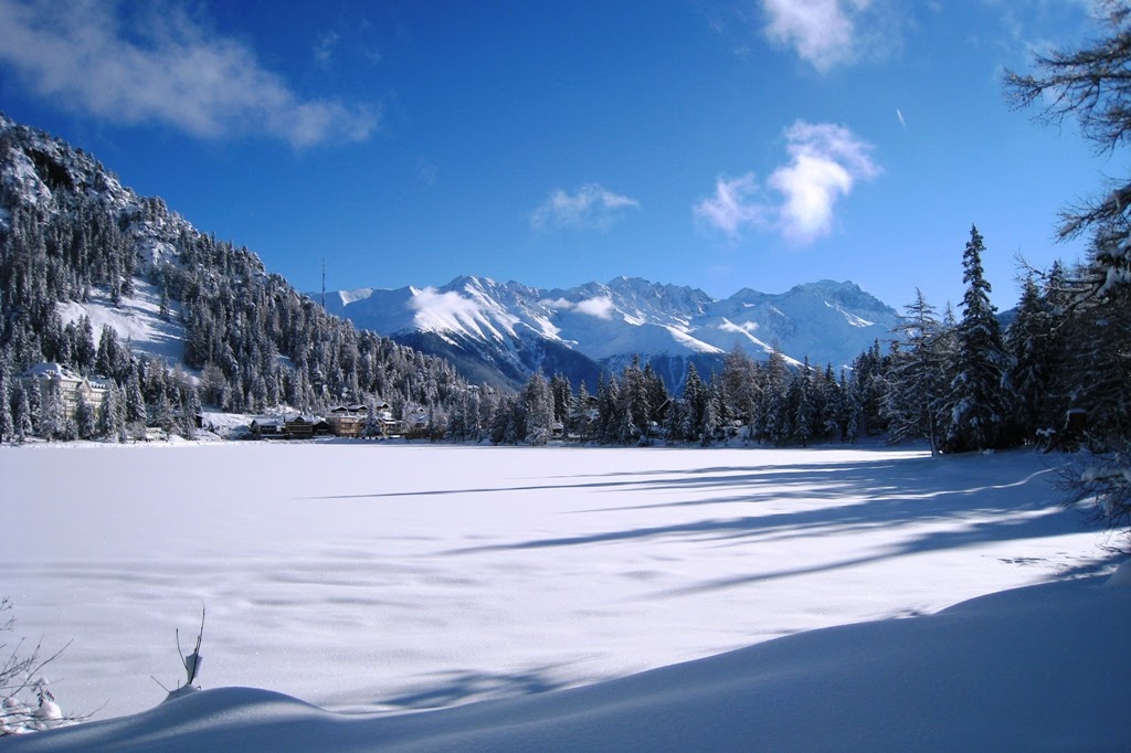 Ski touring tracks climbing into the high Valais mountains above Champex Lac