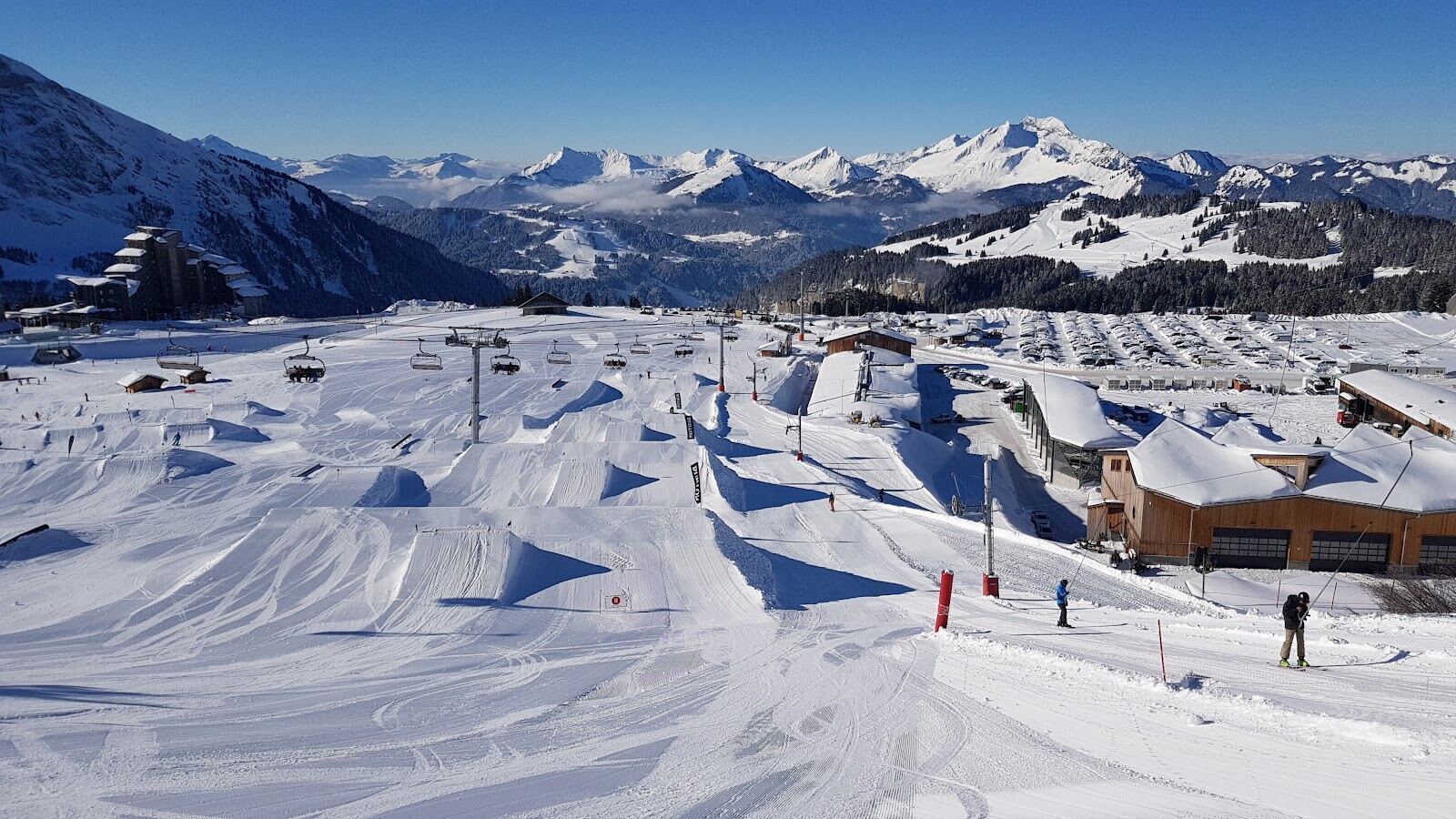 Skiers on the slopes above the Chablais valley