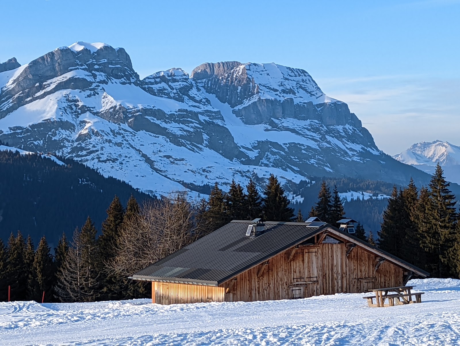 The traditional baroque church of Combloux in the snow