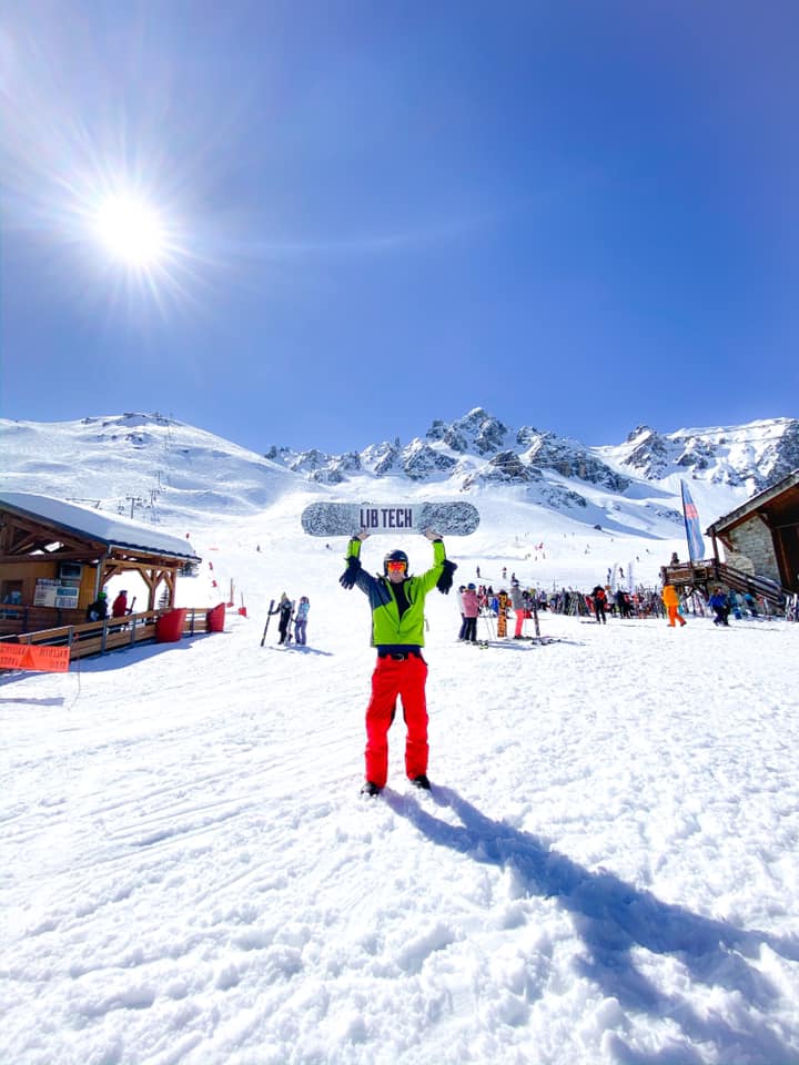Snow covered chalets and pistes at Courchevel