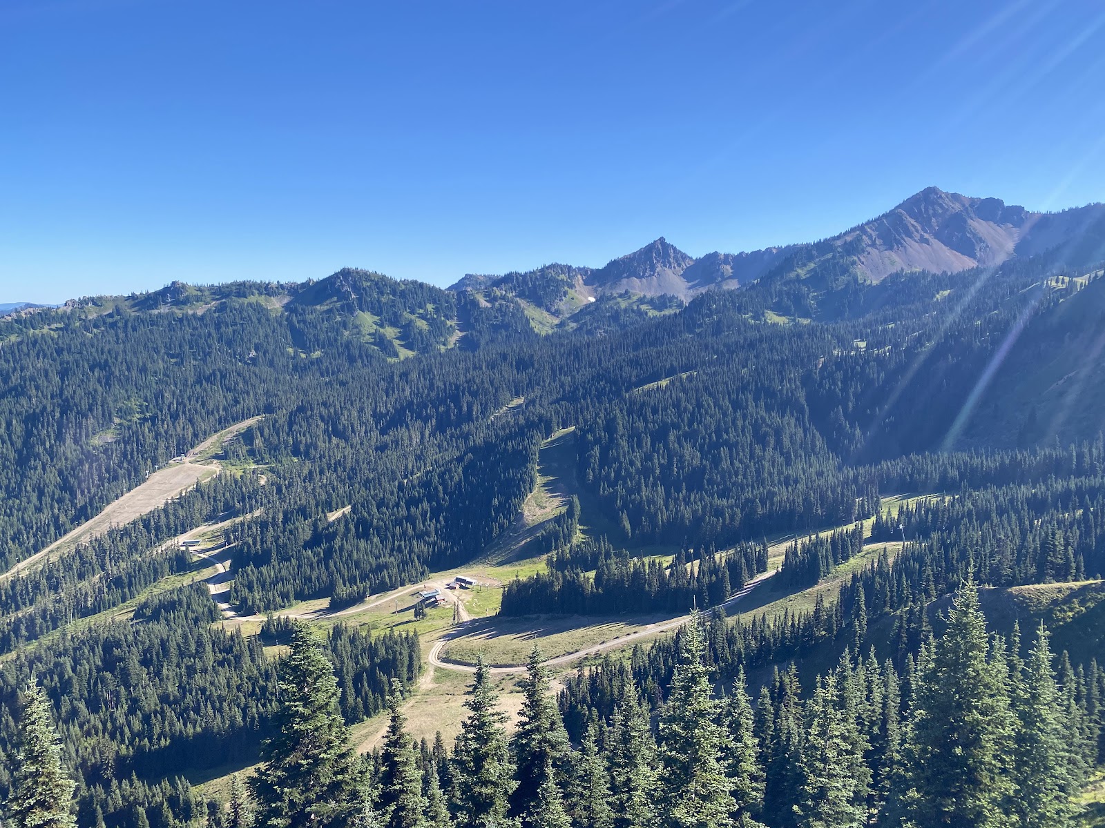 Snow covered trees and slopes at Crystal Mountain base