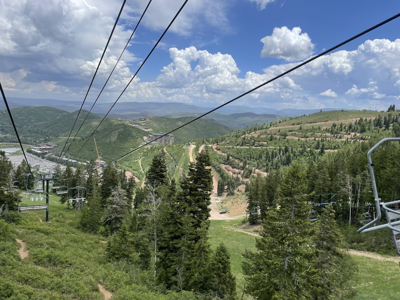 Snowy lodges and a chairlift base area at Deer Valley resort