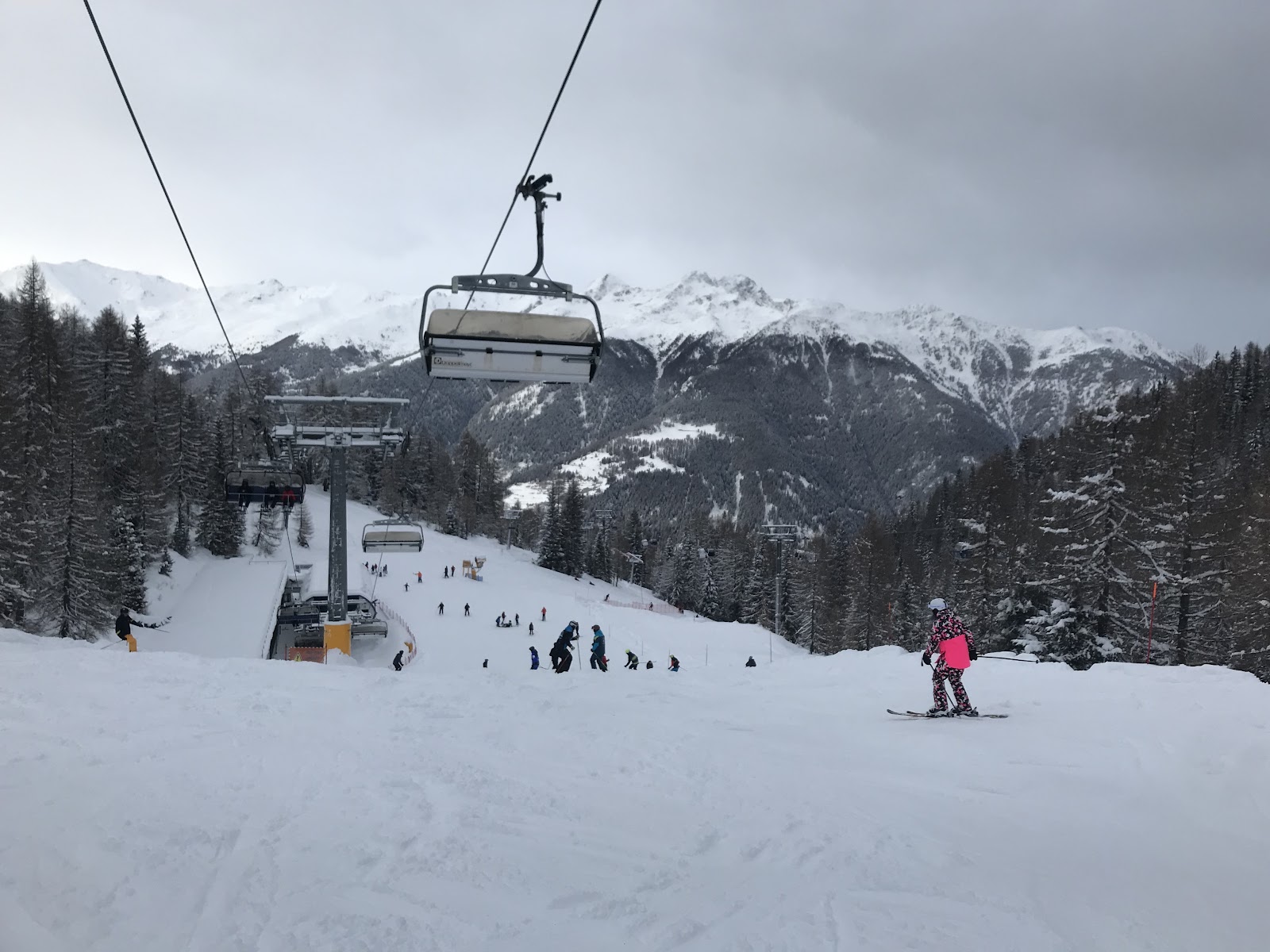 Chairlift rising over the slopes near Marilleva