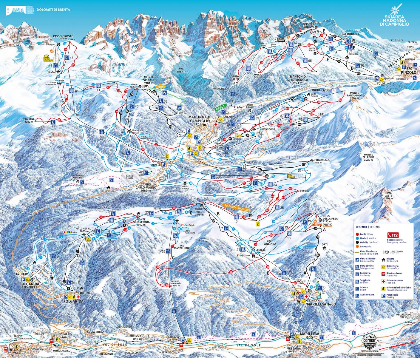 Snowy pistes and pines in the Val di Sole