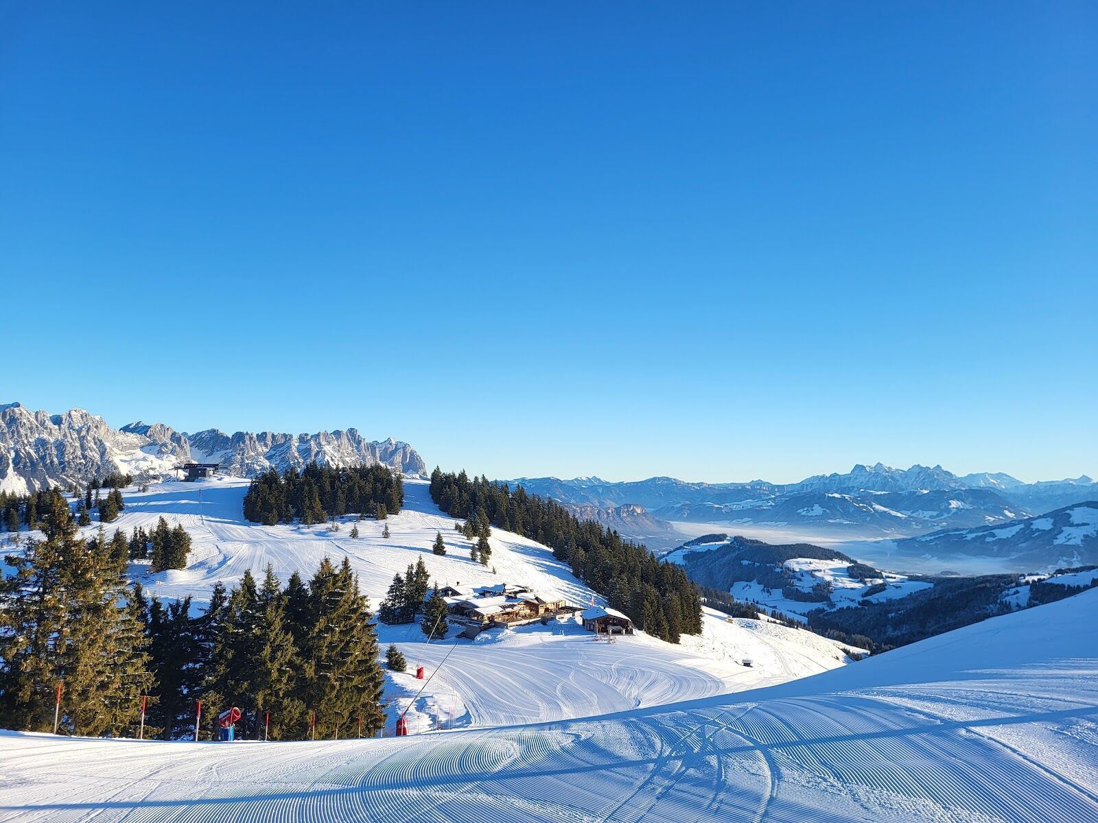 Gentle sunny SkiWelt pistes under the Wilder Kaiser near Going
