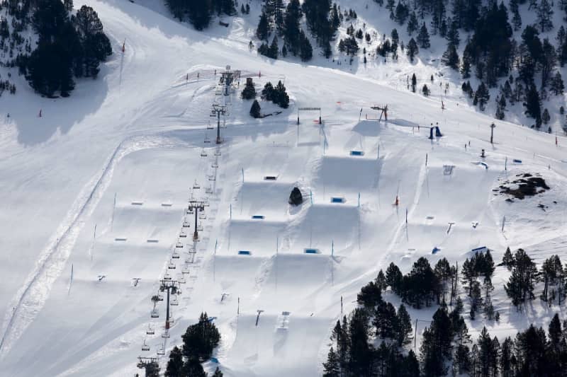 Wide pisted slopes and open ridges above Soldeu in the Grandvalira ski area, Andorra