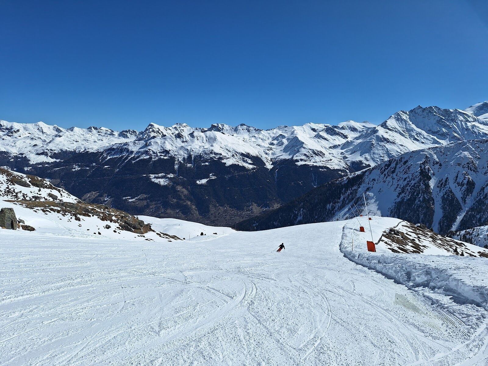 Sunny family pistes on the slopes above Grimentz village