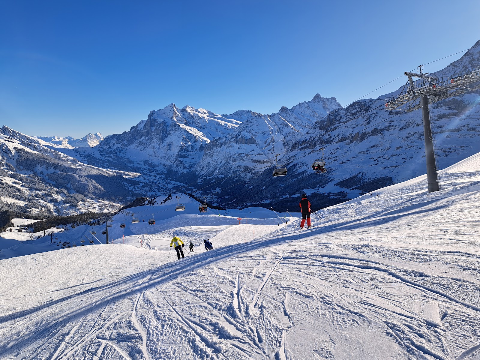 The village of Grindelwald under snow beneath the Eiger north face