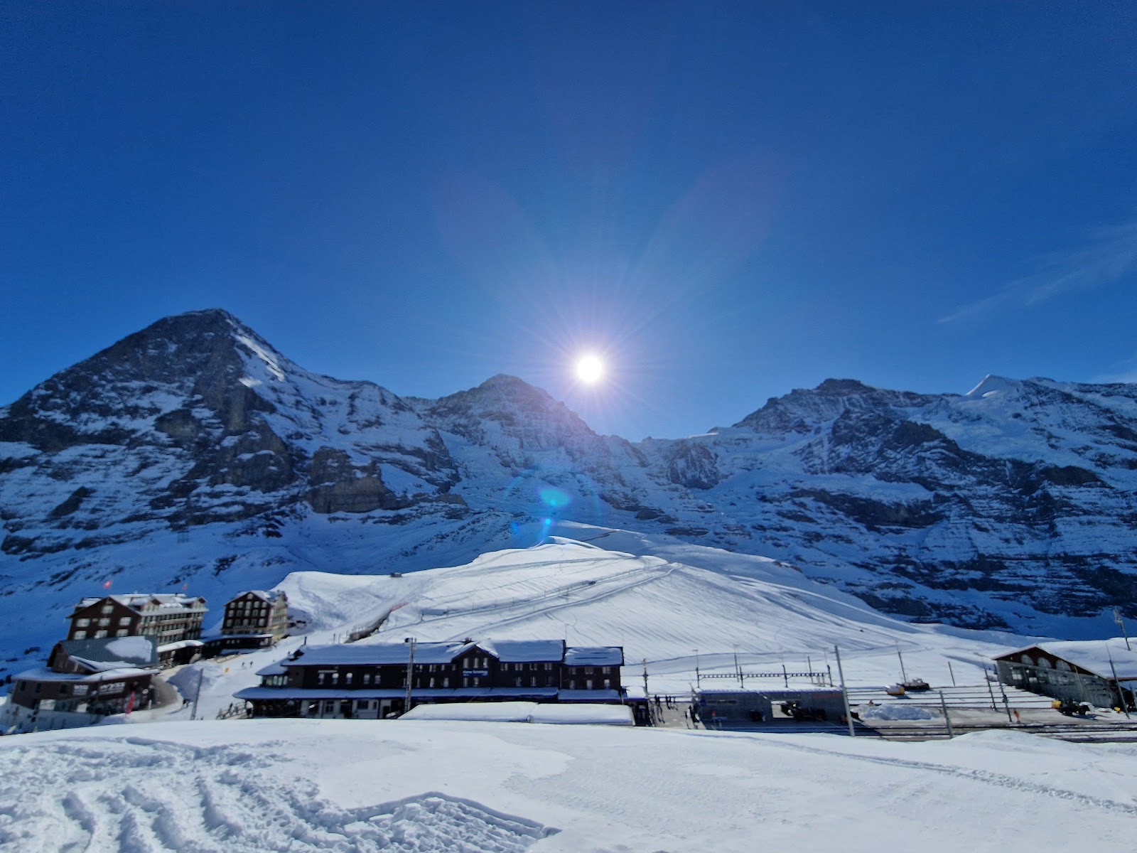 A cog railway climbing toward Kleine Scheidegg above Grindelwald