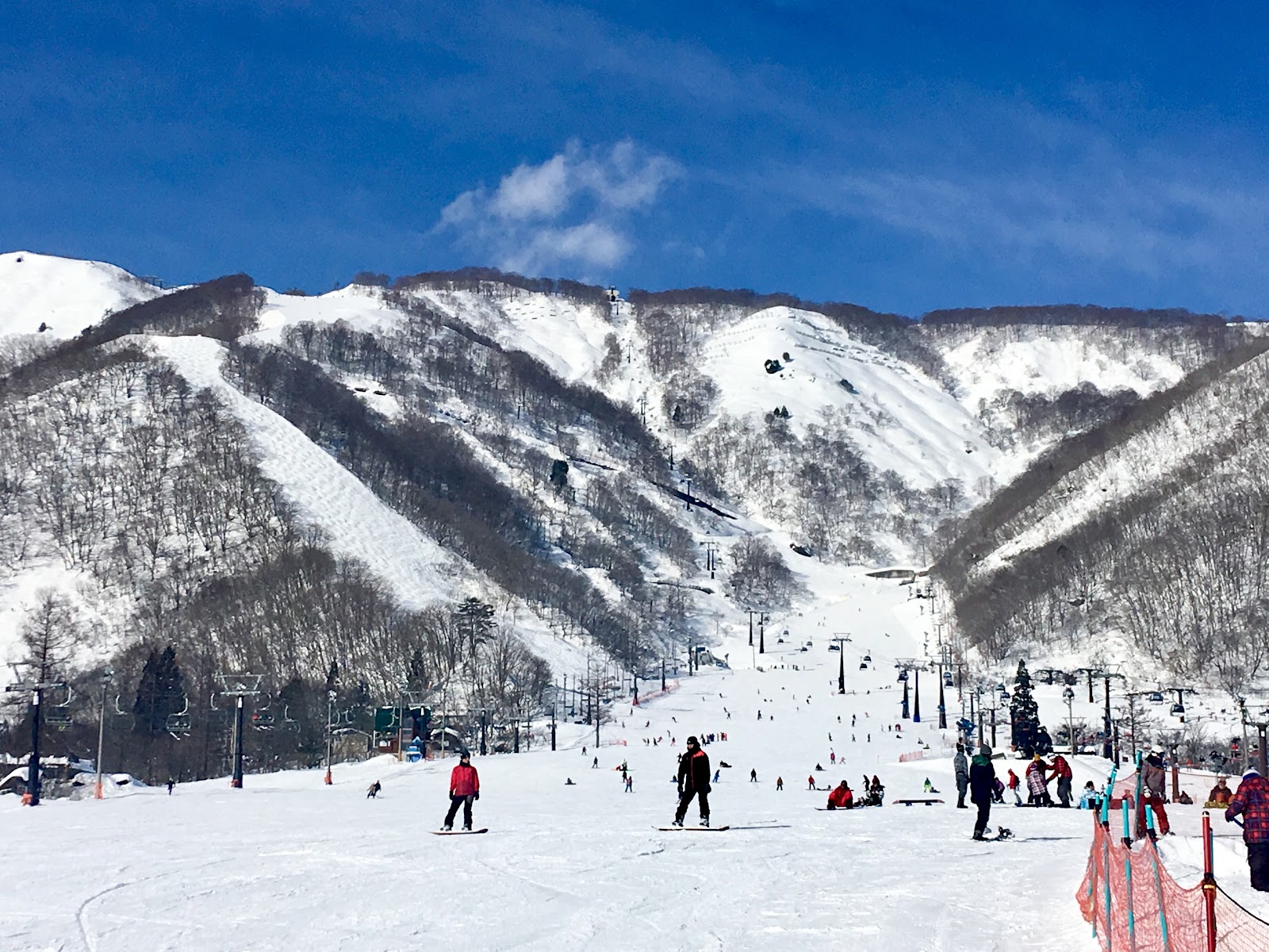 Snowy pistes and the lift base at Hakuba Goryu in the Japanese Alps of Nagano