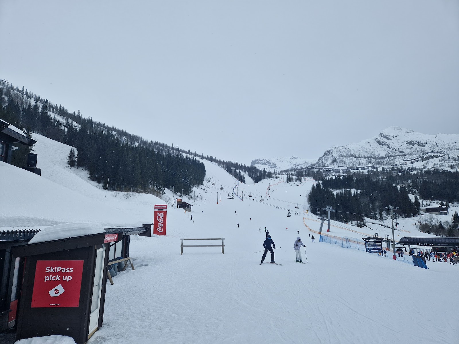 Skiers on a steep red run high on Totten at Hemsedal