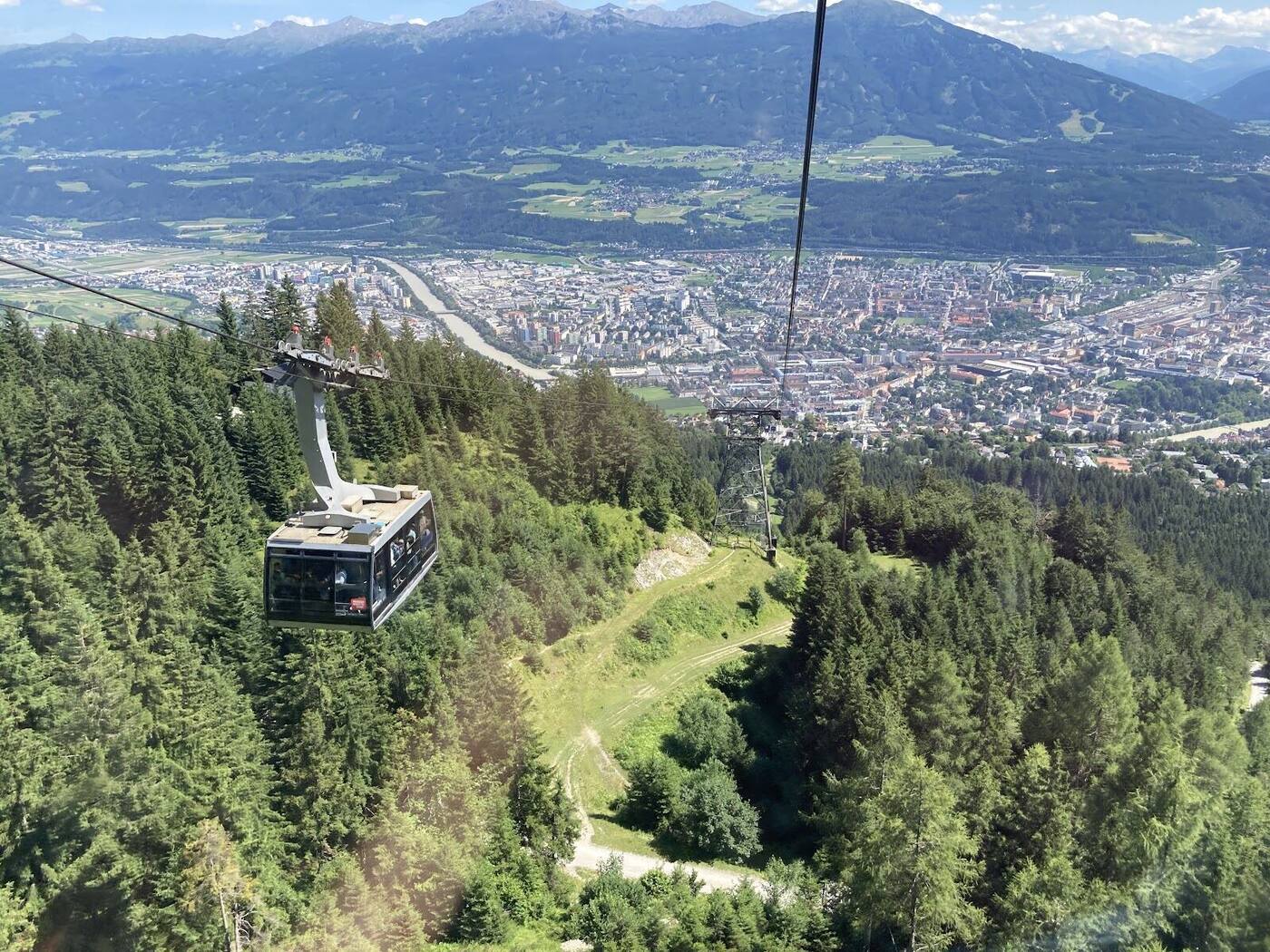 Steep skiing high on the Nordkette with the city far below