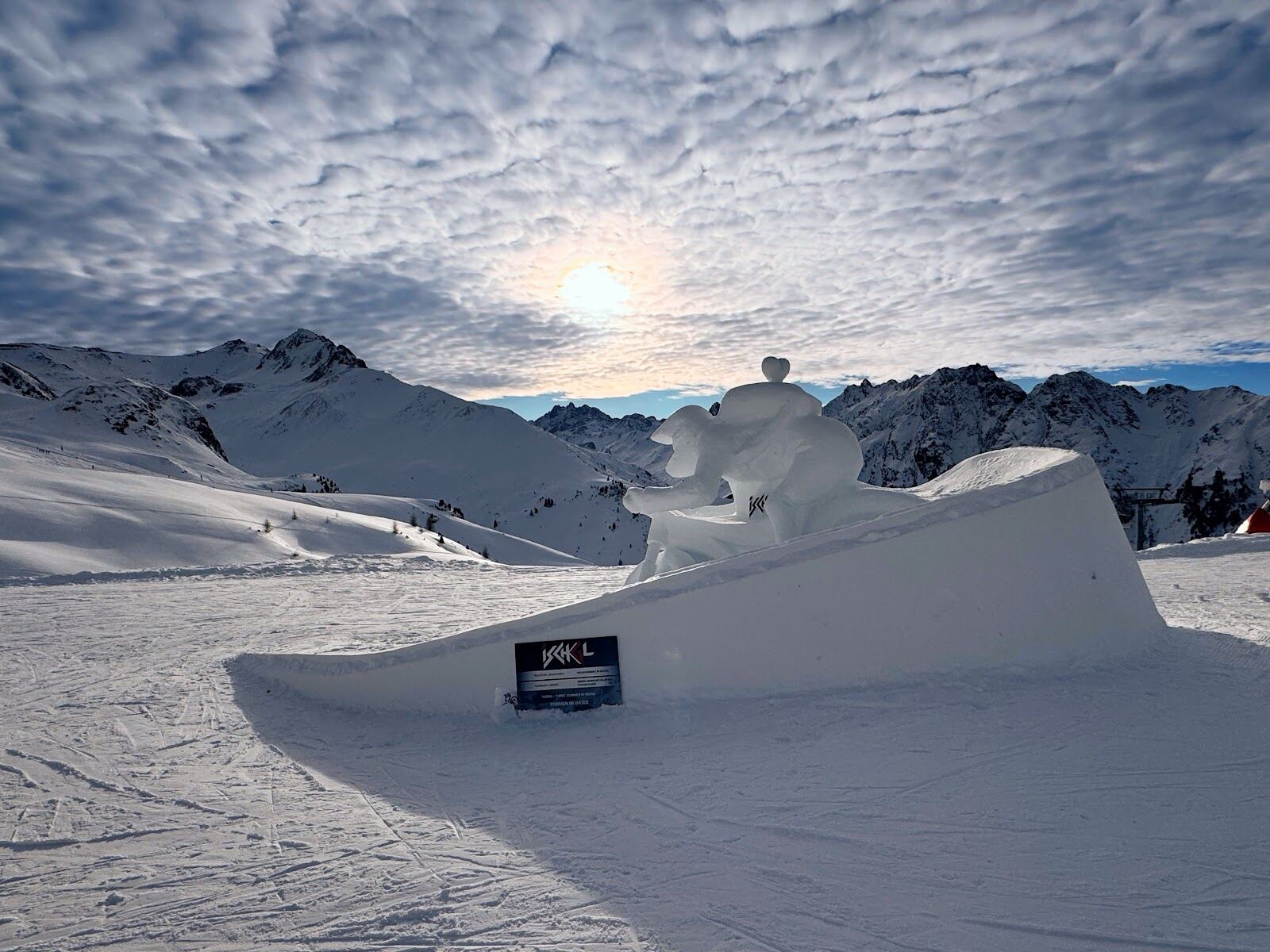 The modern resort town of Ischgl below the snowy peaks of the Paznaun valley