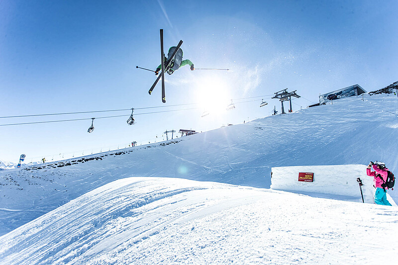 The Hochzillertal ski area rising above Kaltenbach in the Zillertal valley