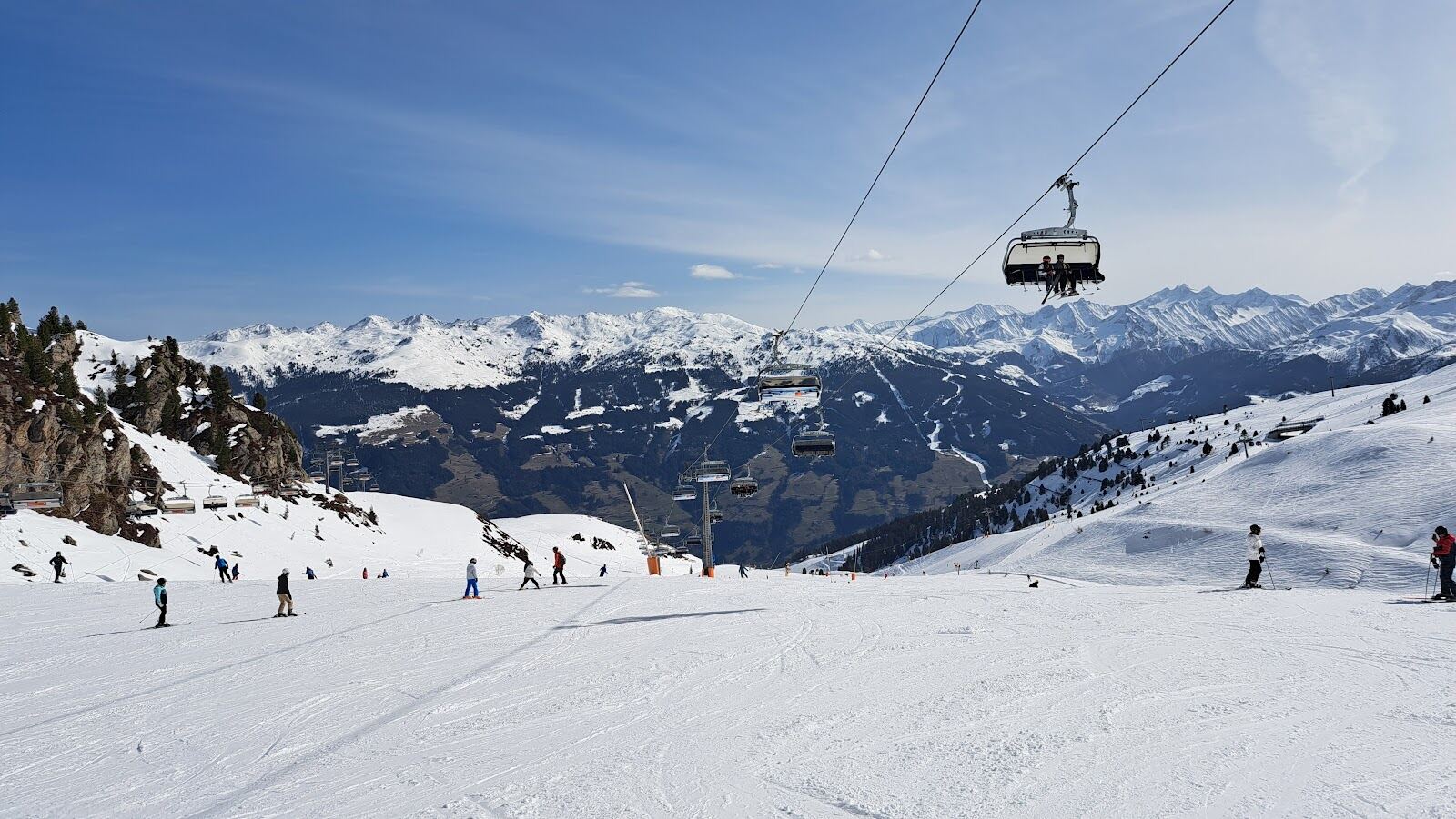A modern gondola rising over the Hochzillertal ski area