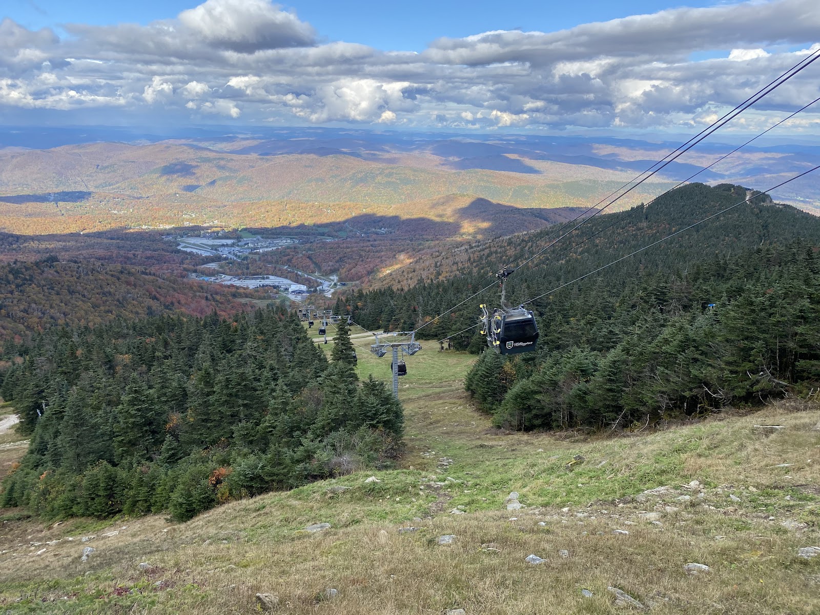 Snow guns firing across a Killington trail in early season