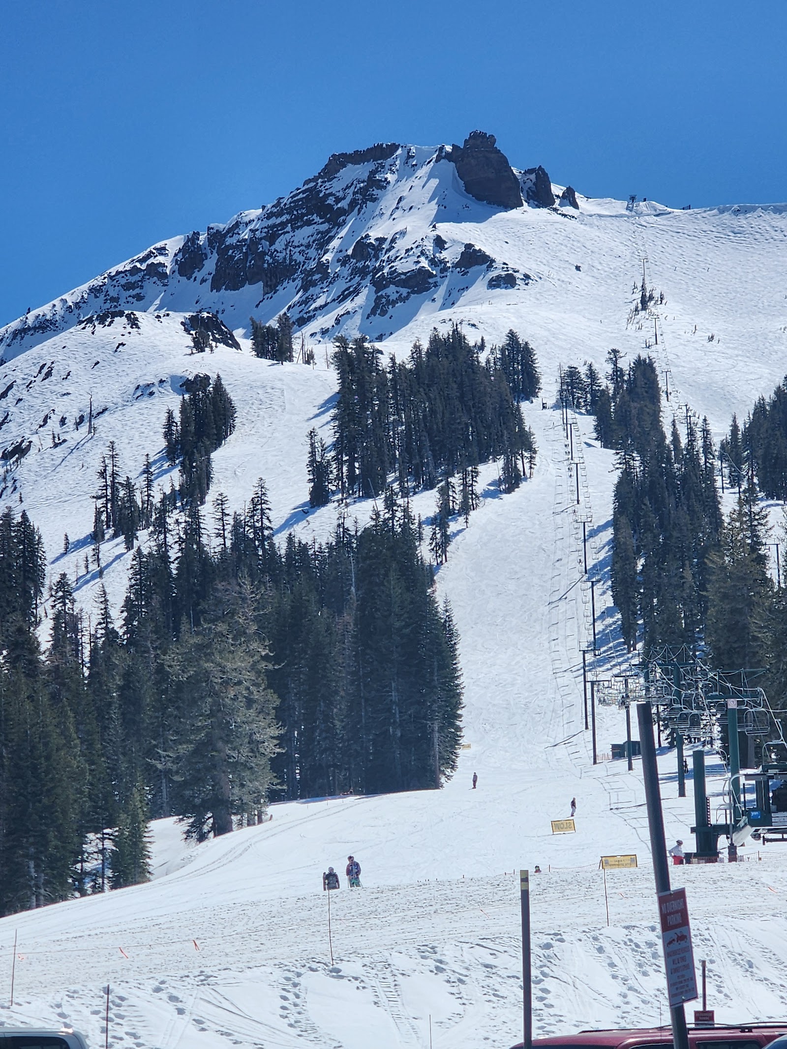 A skier carving deep Sierra powder