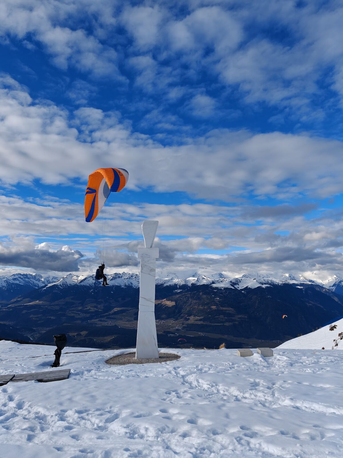Snowy South Tyrol town of Bruneck below the mountain