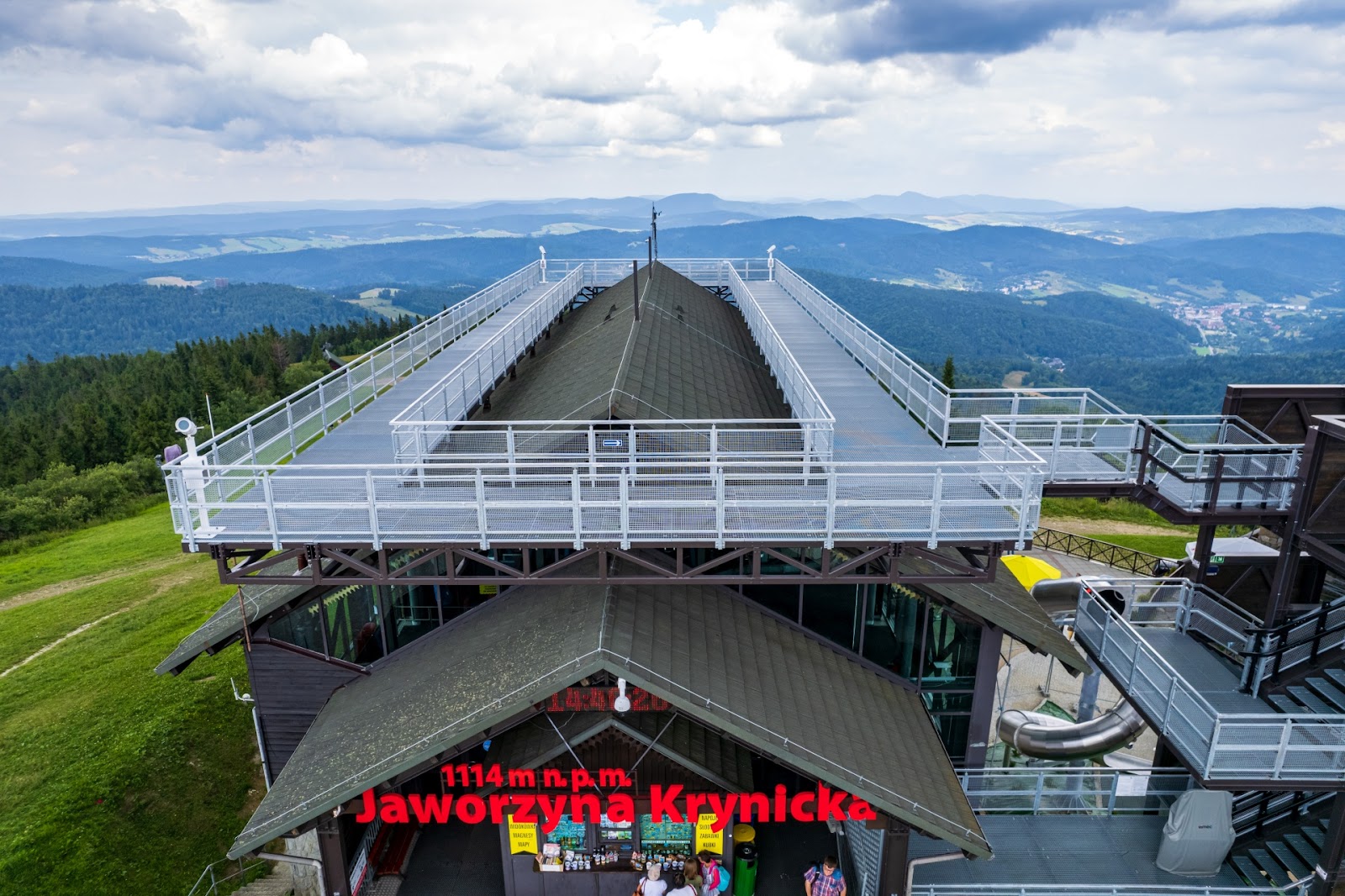 Snowy pistes and gondola above the spa town of Krynica in Poland