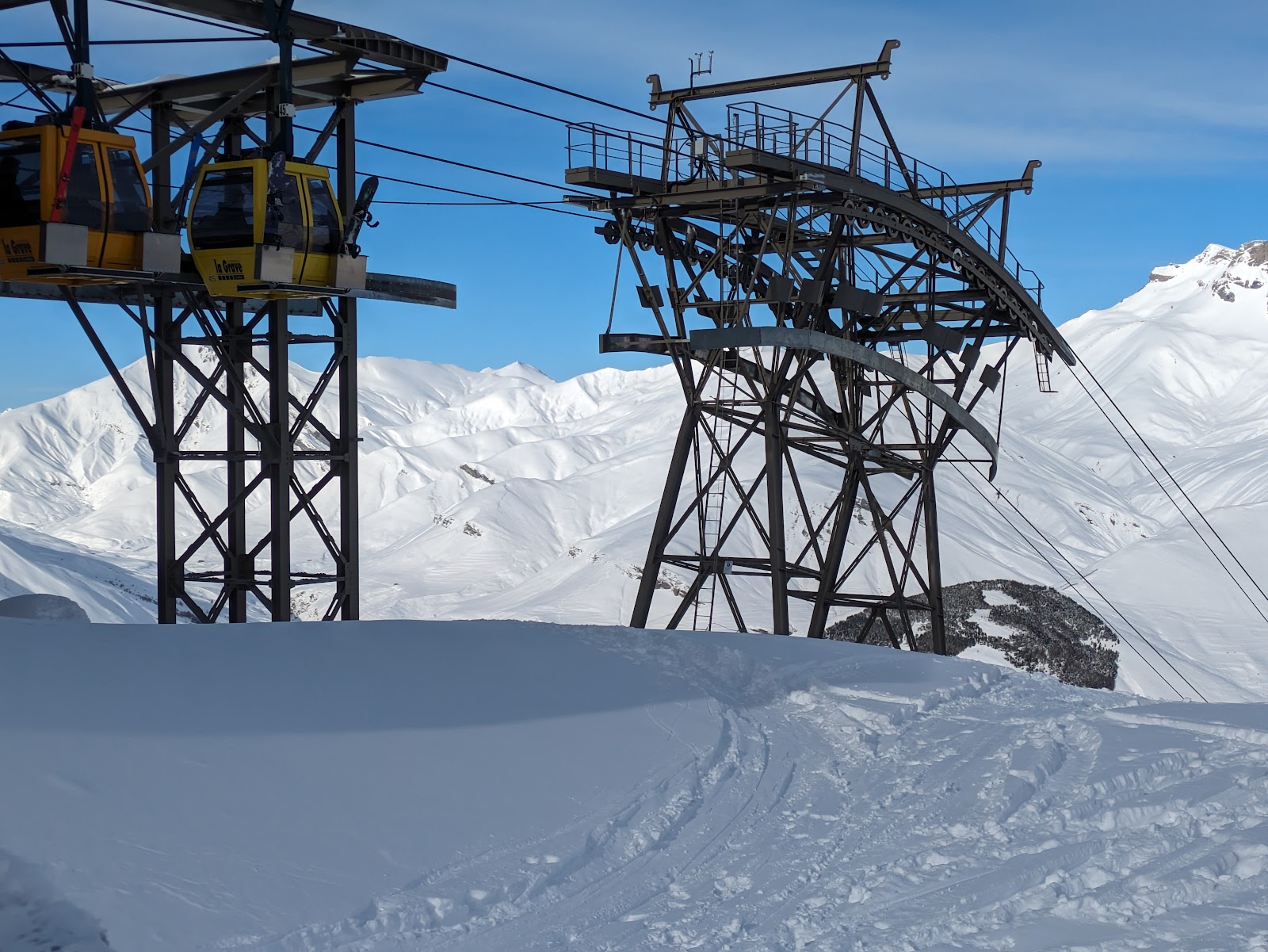 Skiers on open ungroomed glacier terrain