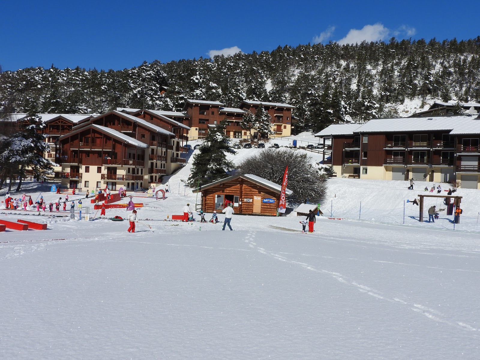 A gentle sunny beginner piste at La Norma