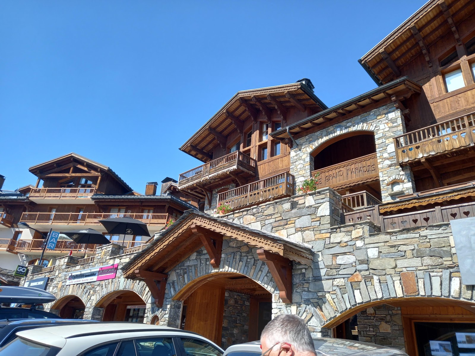 The sunny pistes and modern chalets of La Rosiere under winter snow
