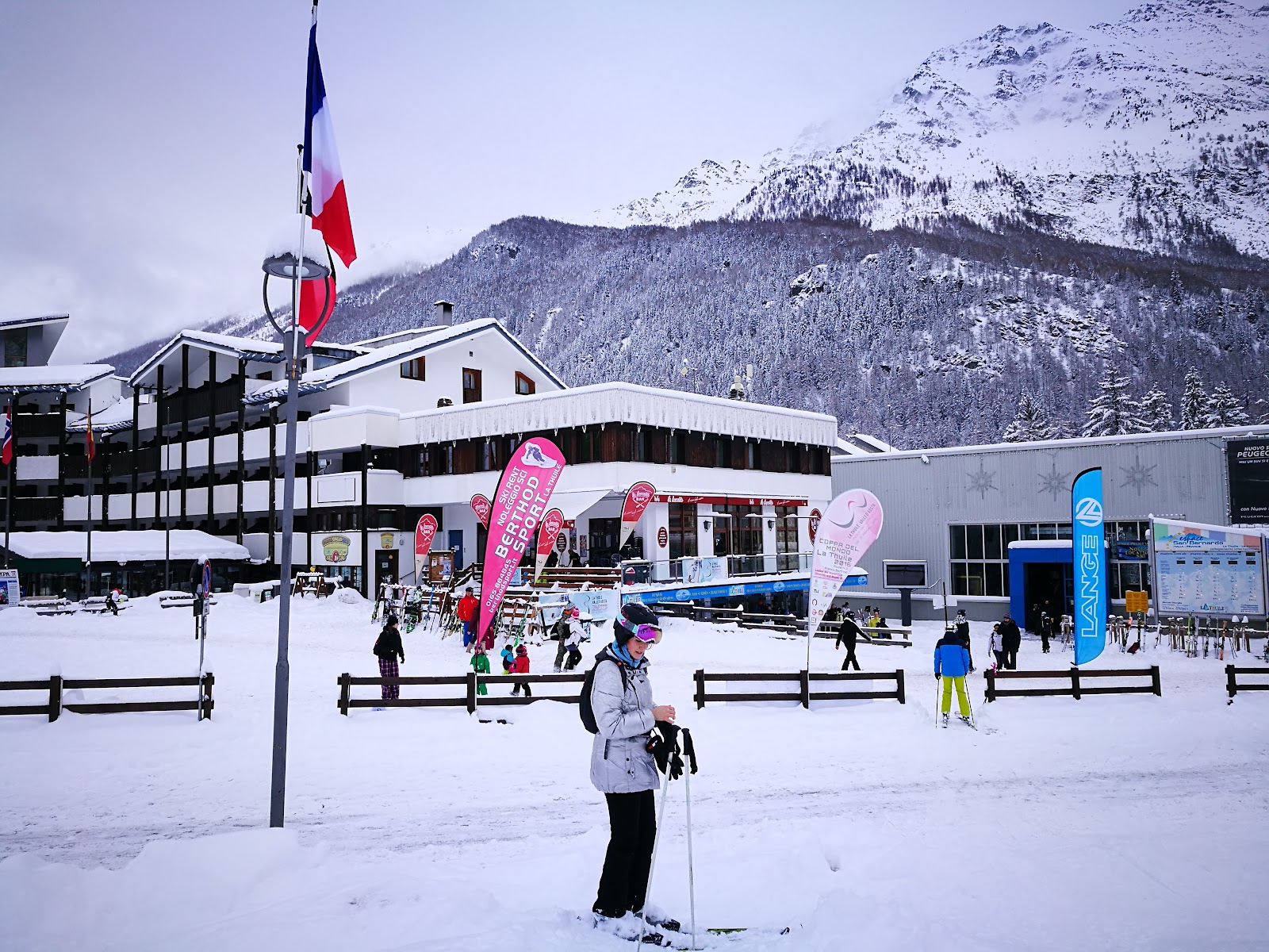 A steep black race piste above La Thuile dropping toward the valley