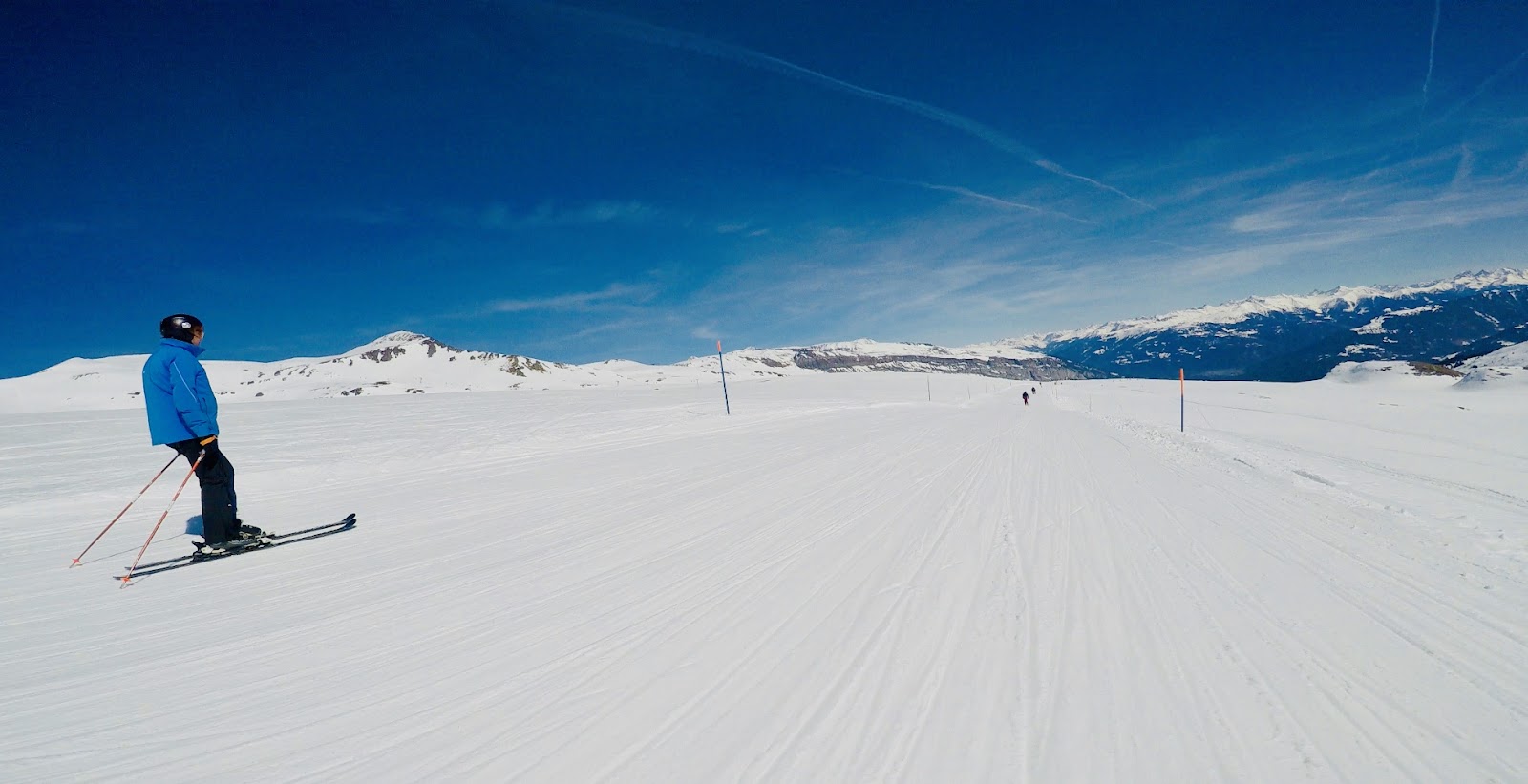 Wide groomed pistes and modern lifts across the Laax ski area