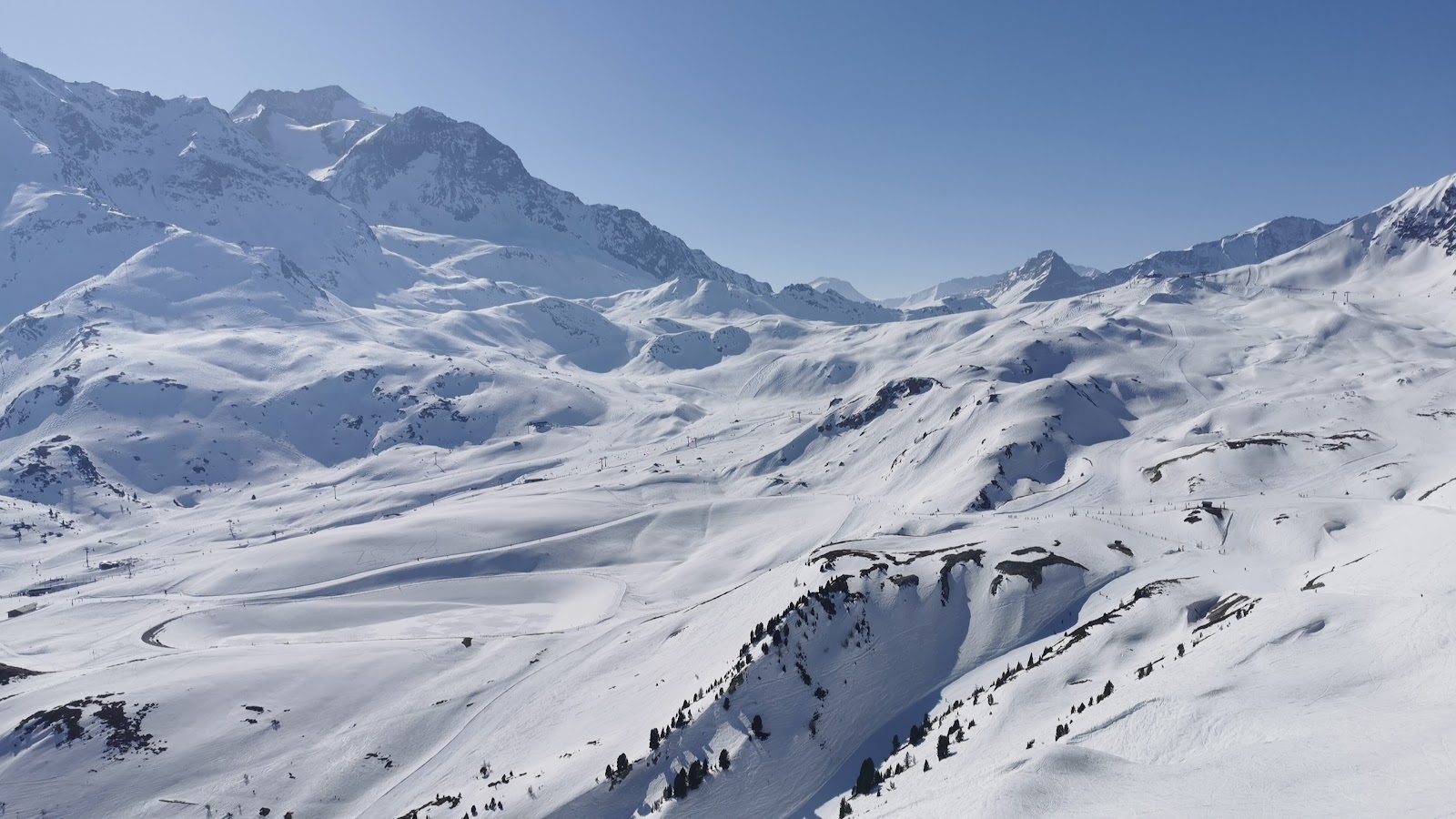 The Aiguille Rouge rising above the high bowls of Les Arcs