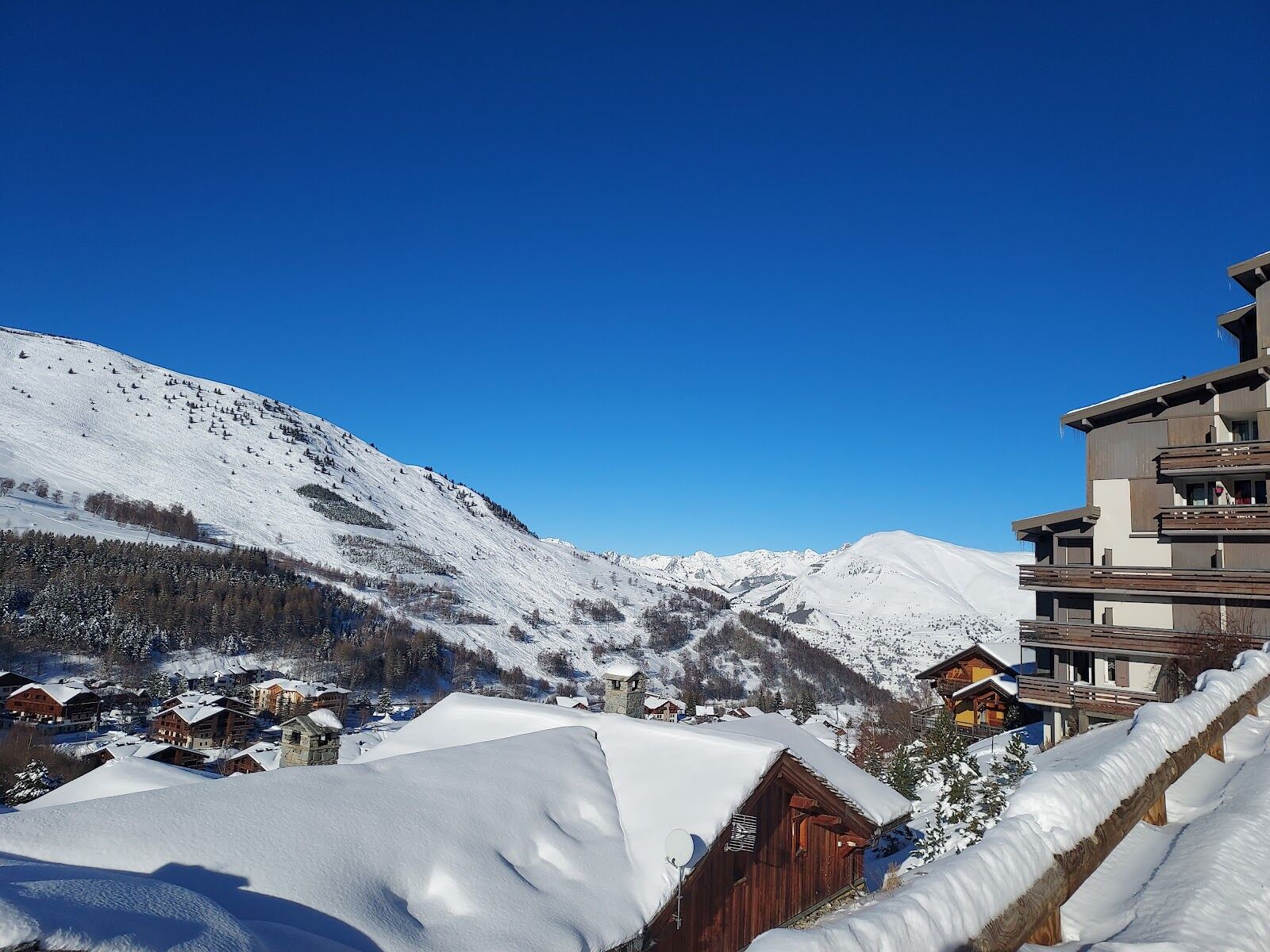 The resort town stretched along its sunny plateau in winter