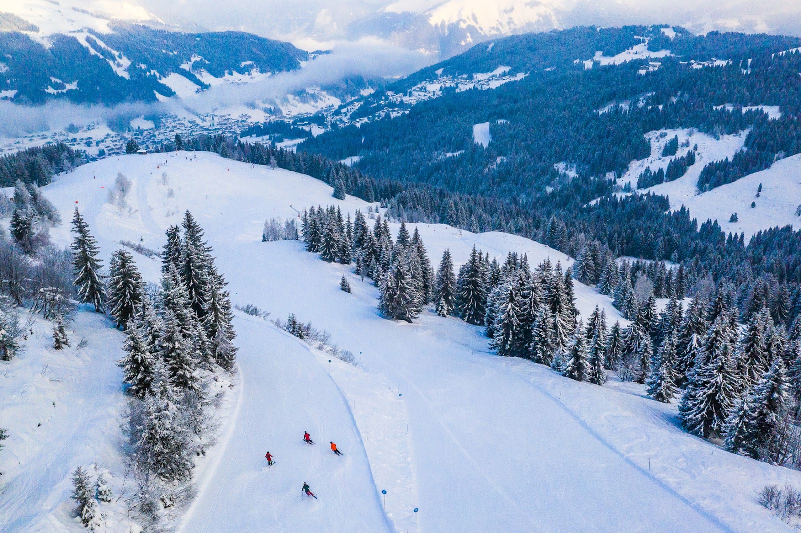 Tree lined ski runs above Les Gets