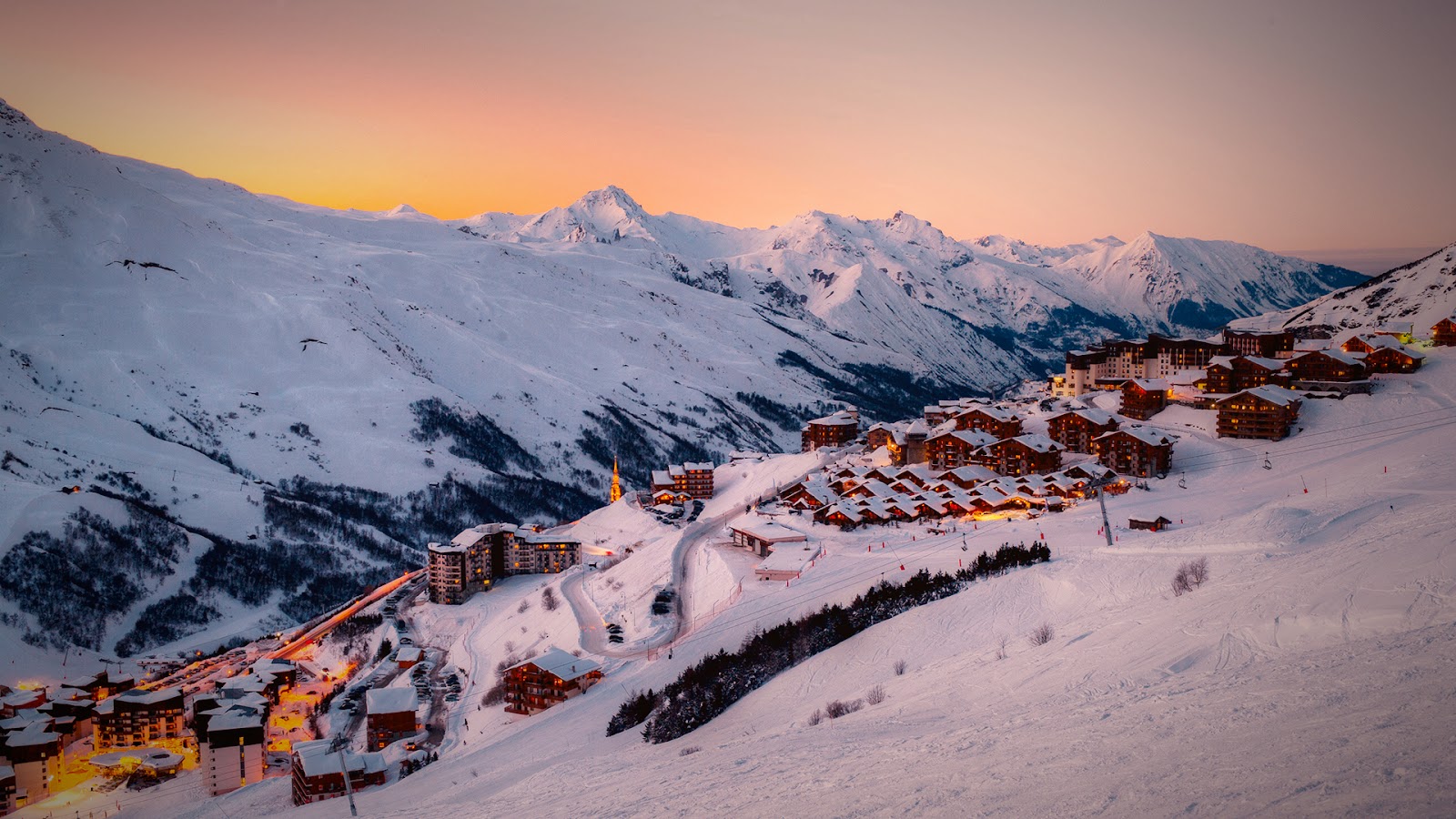 A high snowy ski in ski out resort with wide pistes in the French Three Valleys
